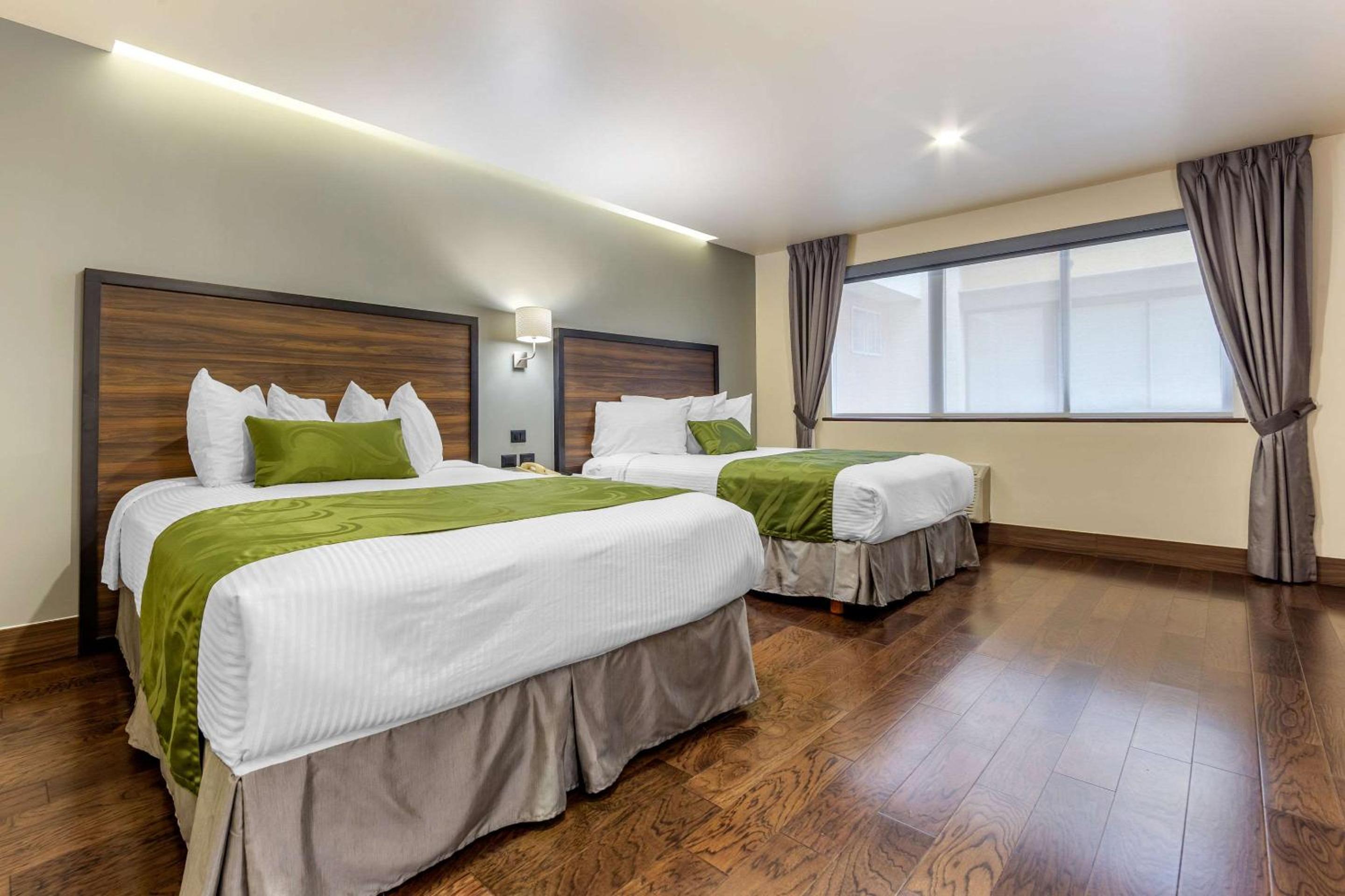 Queen Room with Two Queen Beds - Disability Access/Non-Smoking - Photo 1