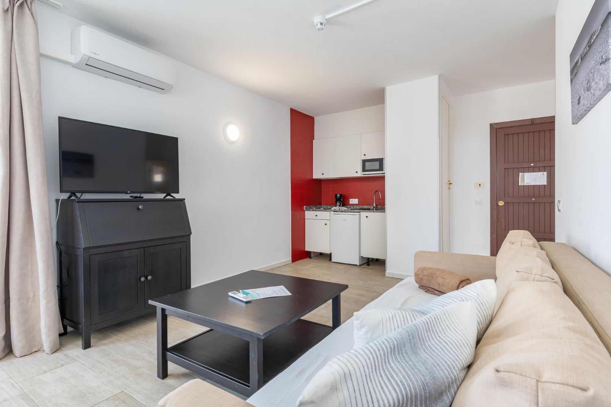 Standard One-Bedroom Apartment with Pool View & Partial Sea View