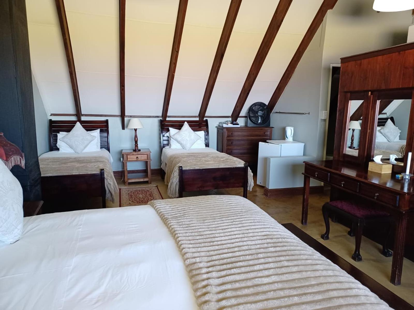 Upstairs Standard Family with a queen and twin beds - Photo 1