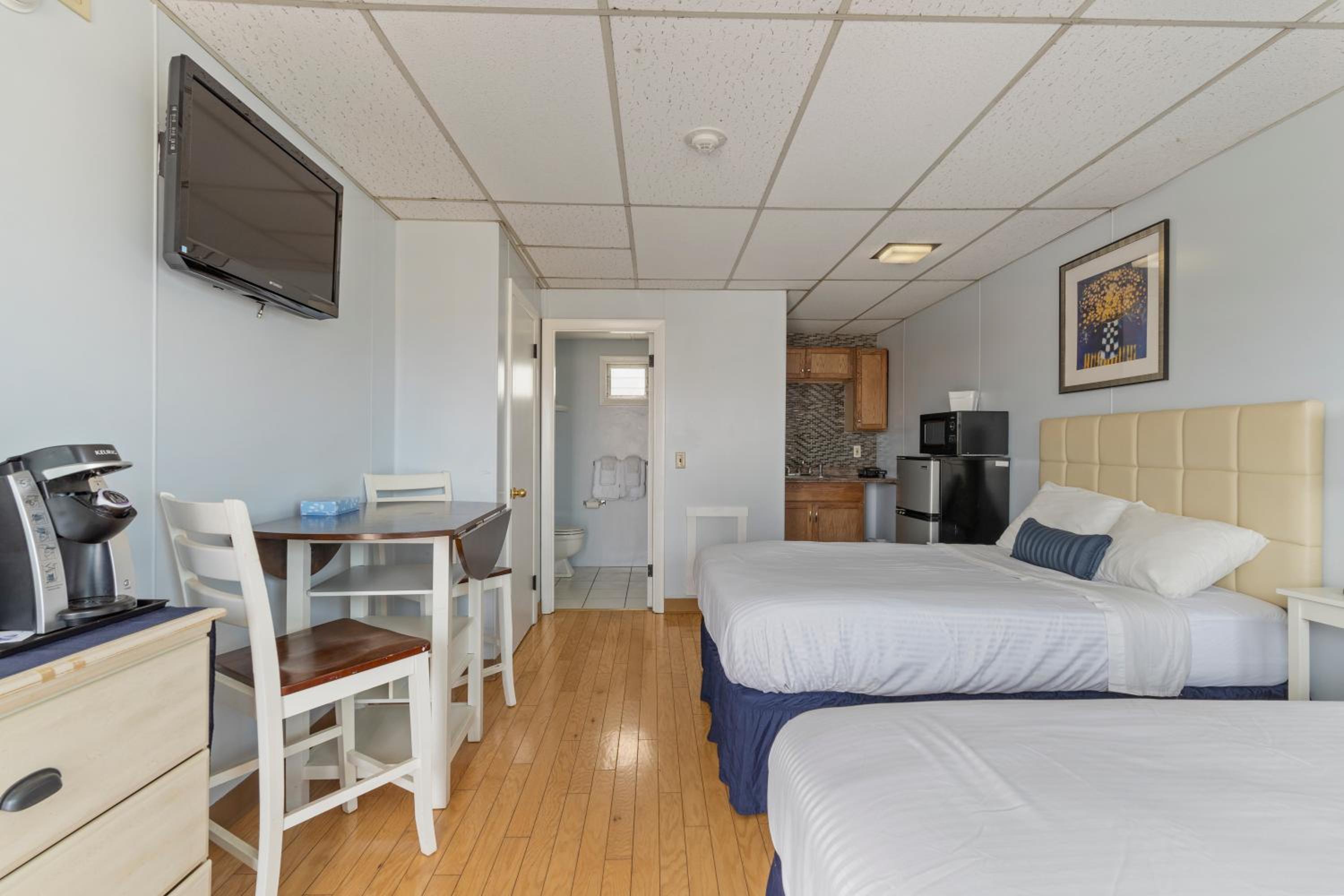 Deluxe Quadruple Room - Photo 6