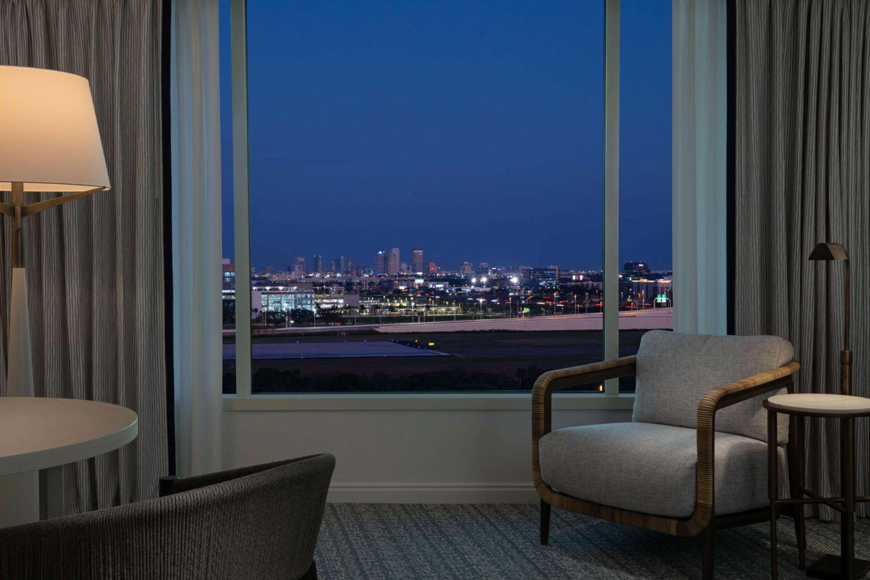 Double Room with Two Double Beds and Runway View - Photo 2