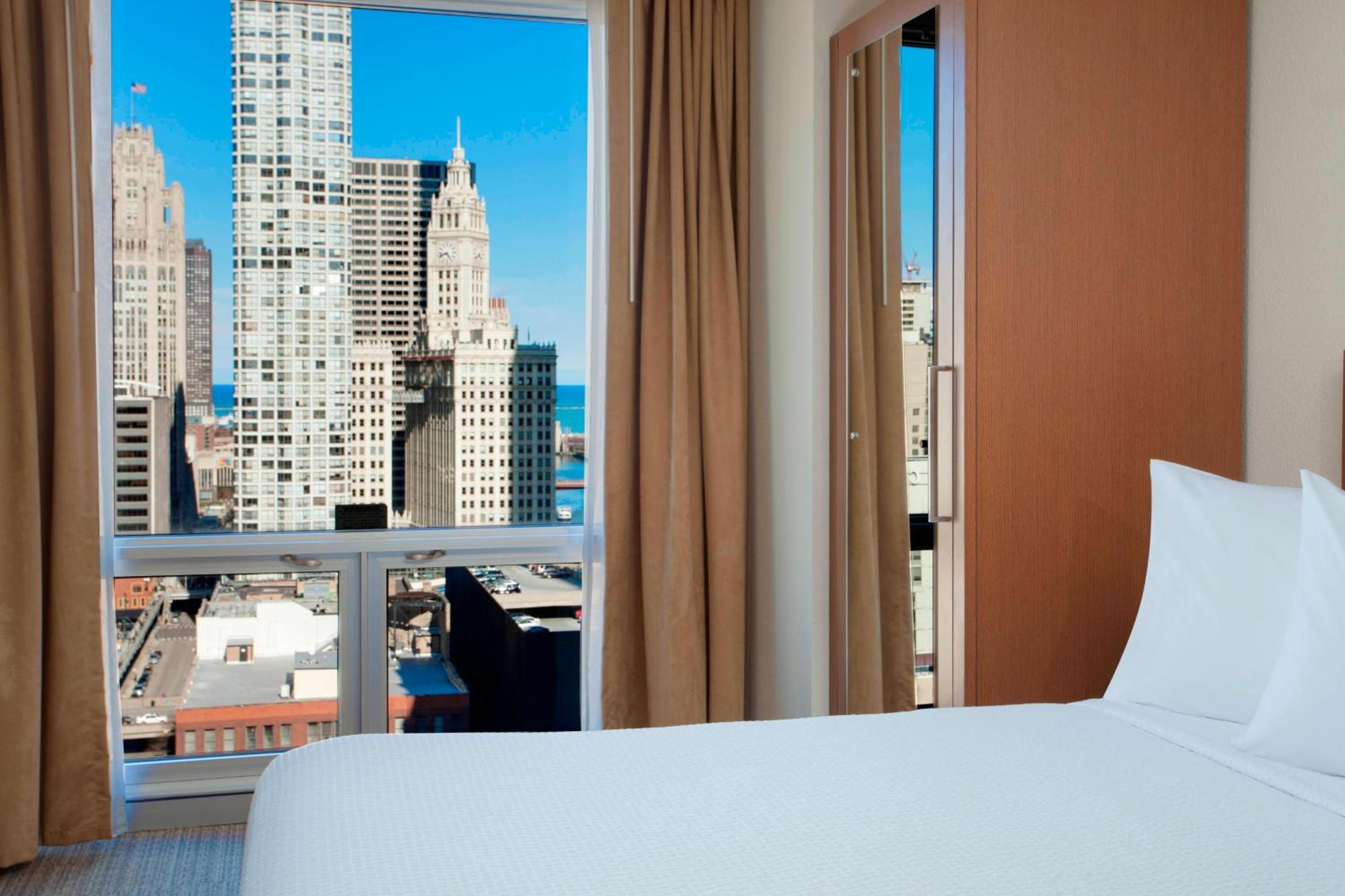 Studio With Two Double Beds With Sofa Bed And City View - High Floor