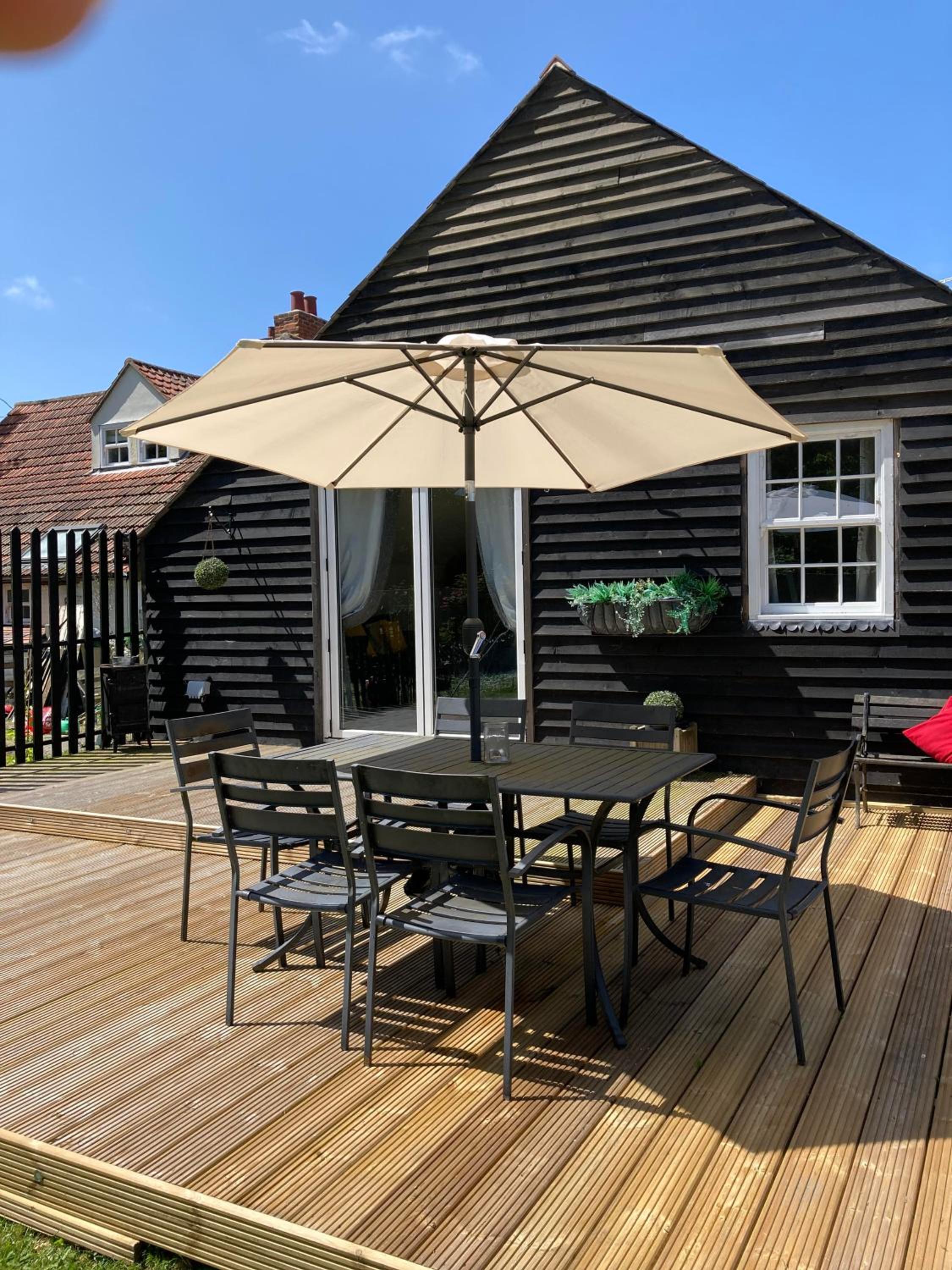 Three-Bedroom House - Photo 31