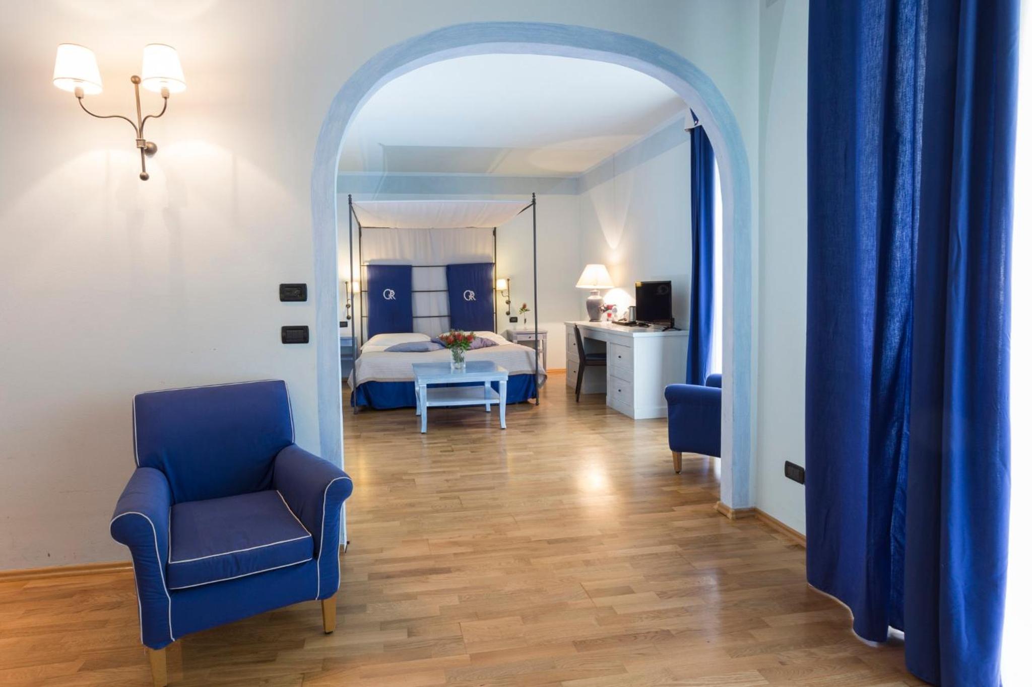 Deluxe Quadruple Room - Photo 4
