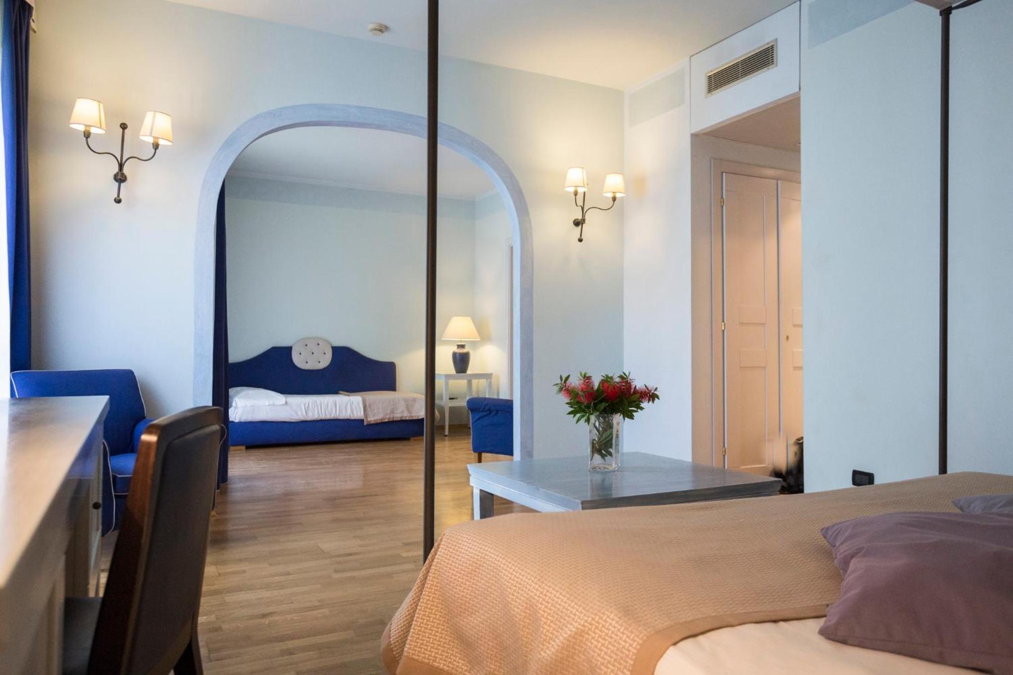 Deluxe Quadruple Room - Photo 1