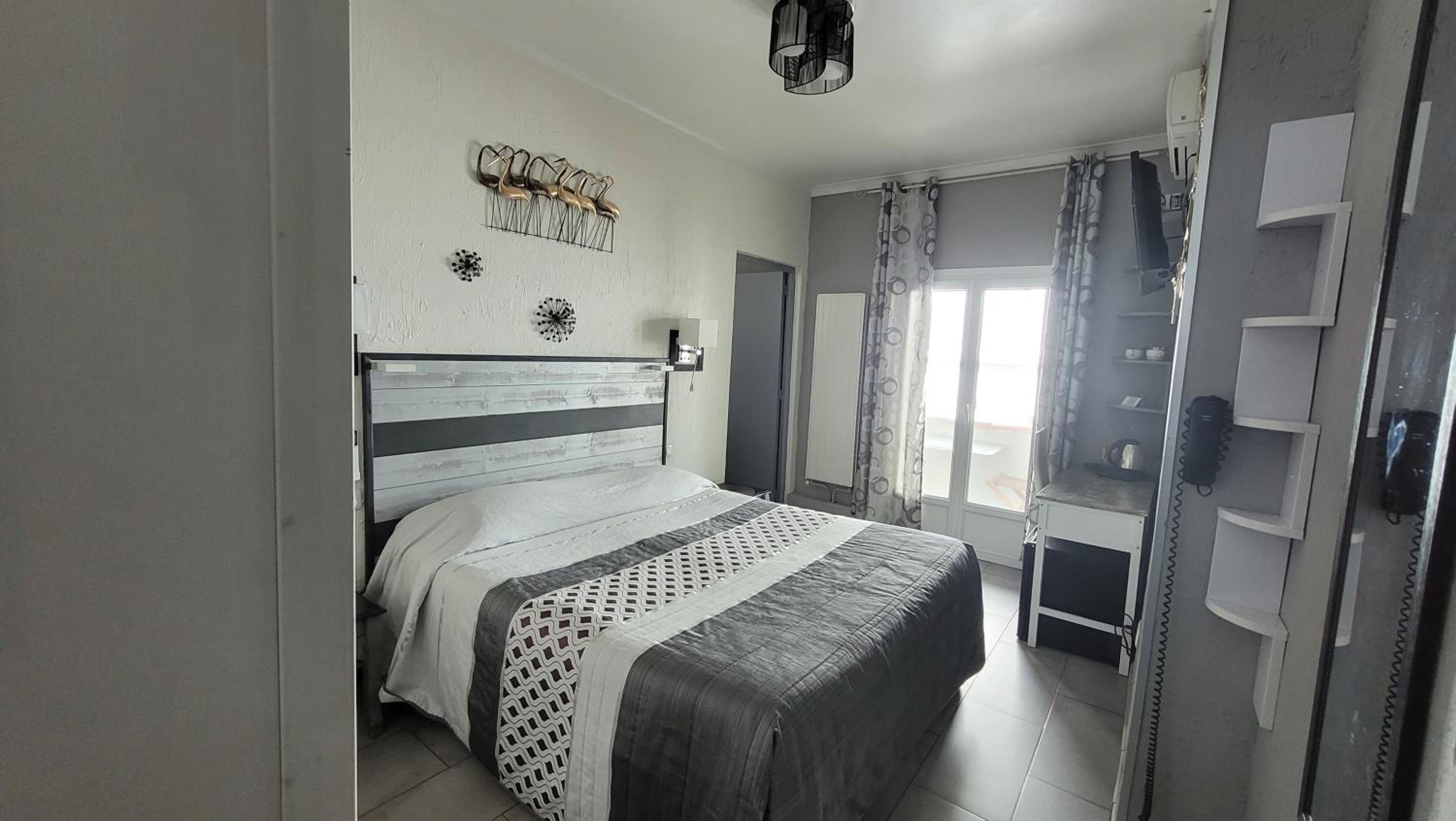 Comfort Quadruple Room with balcony and bathroom