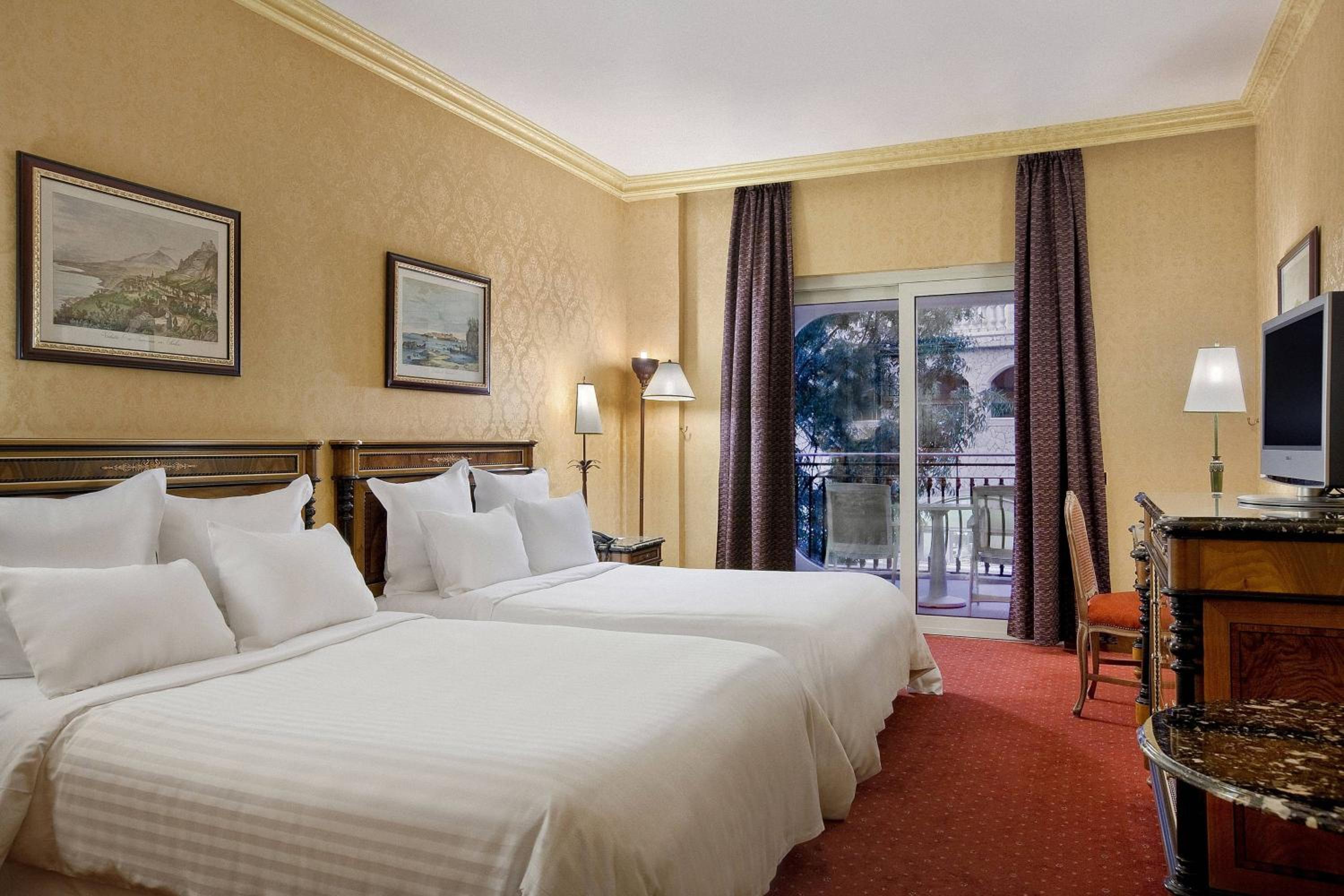 Queen Room with Two Queen Beds and Balcony - Photo 1