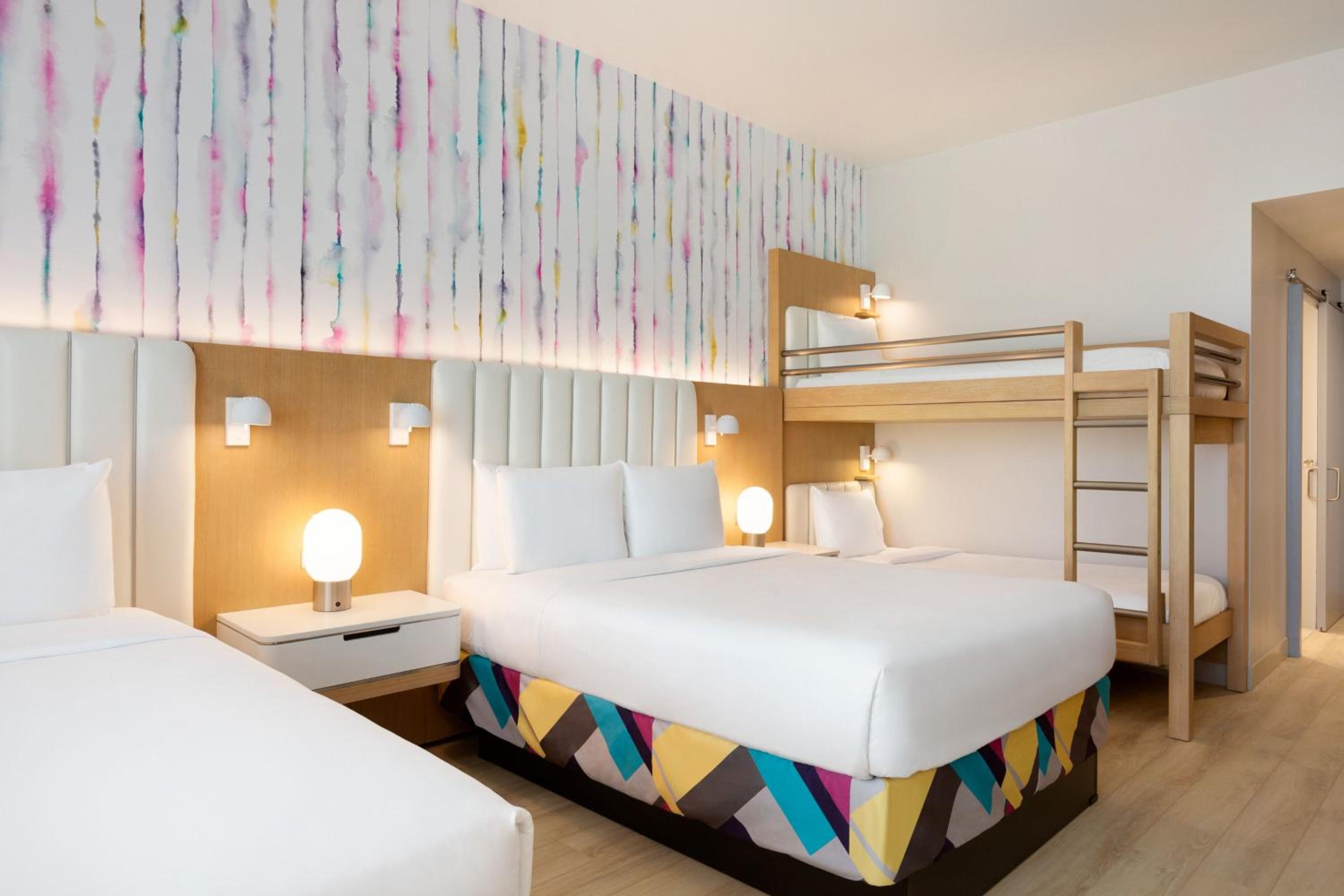 Queen Room with Two Queen Beds and Bunk Beds - Photo 3