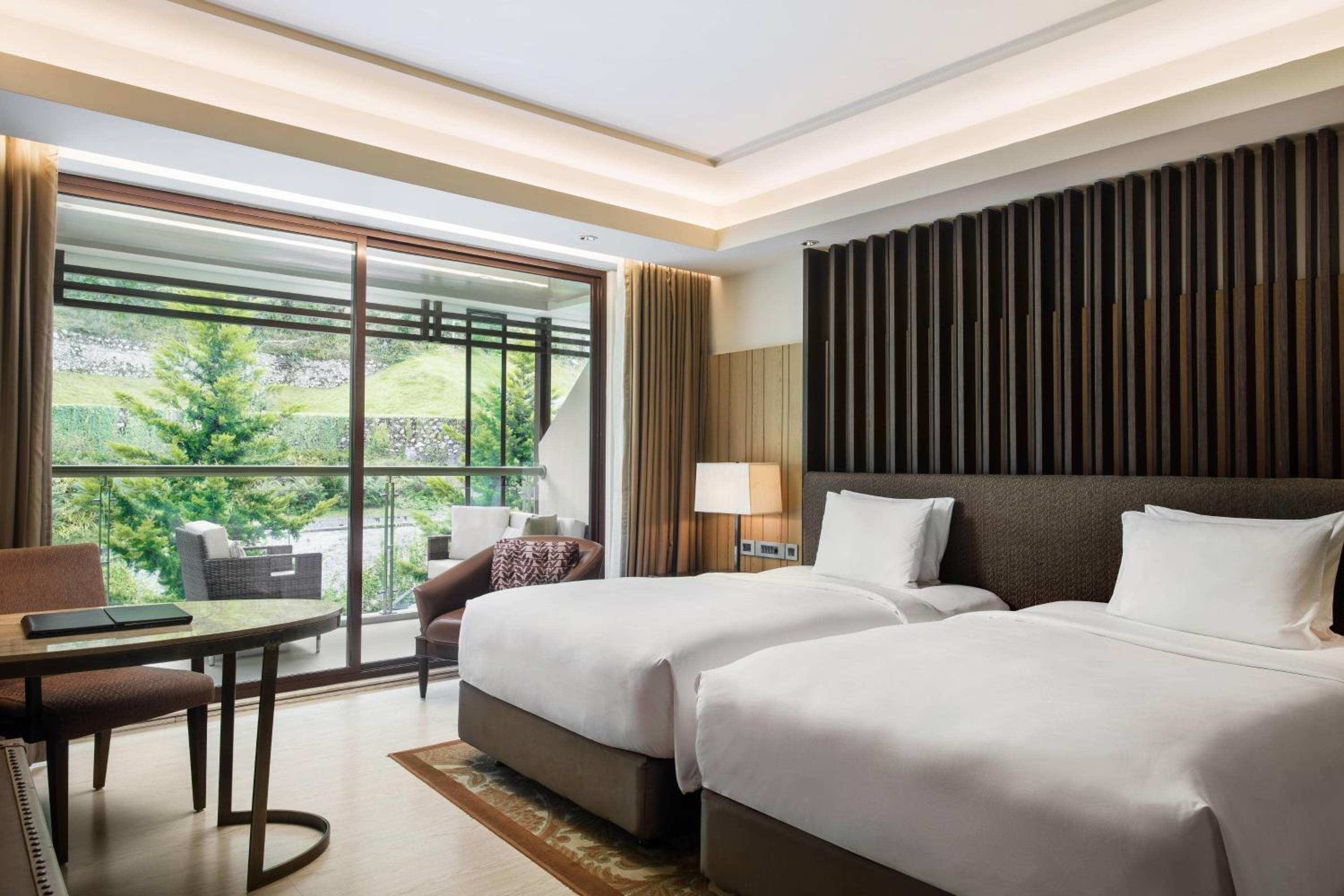 Deluxe Twin Balcony Room with Bathtub - Enjoy INR 1,000 Signature Resort Credit per stay