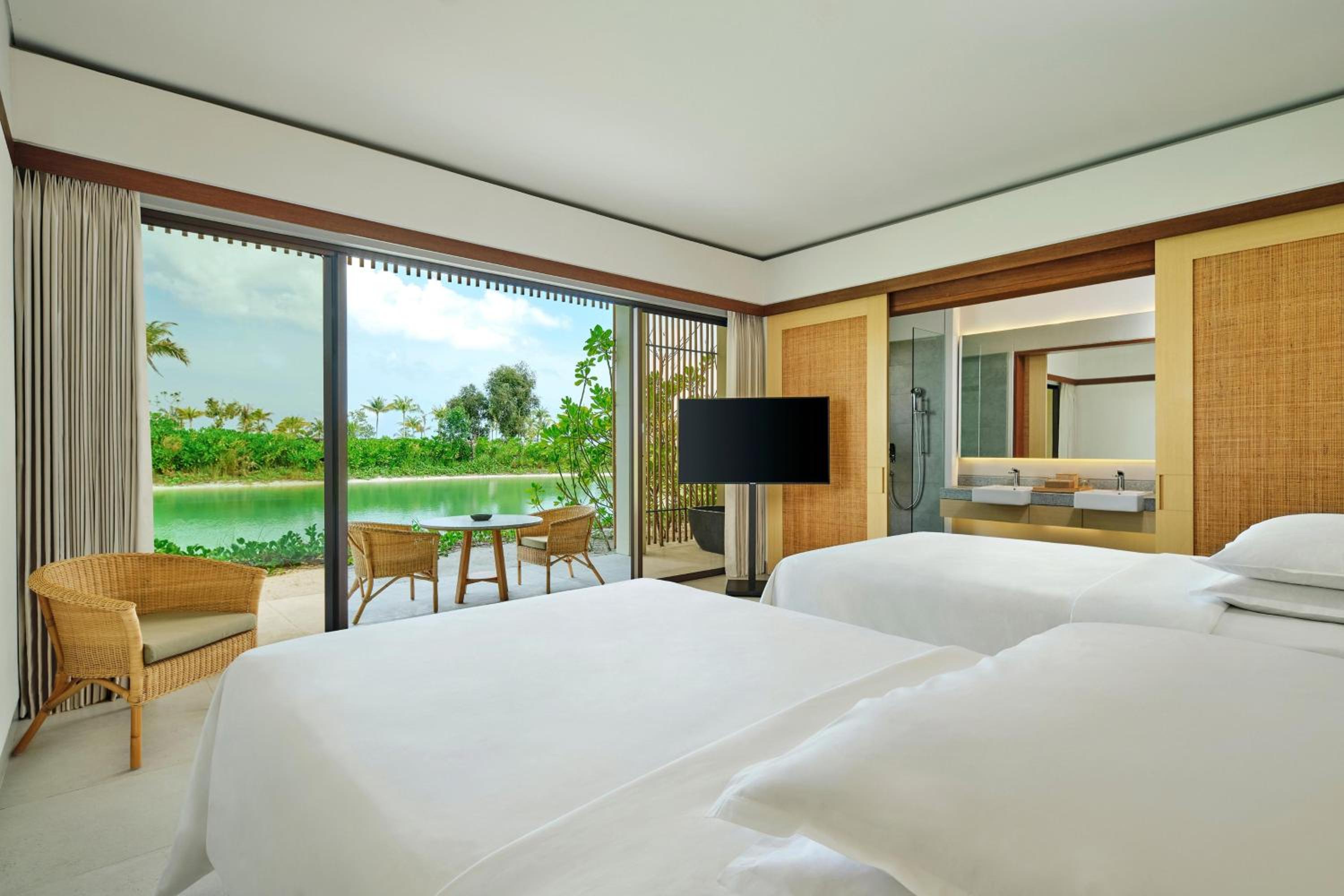 Twin Room with Garden View and Balcony - Photo 1