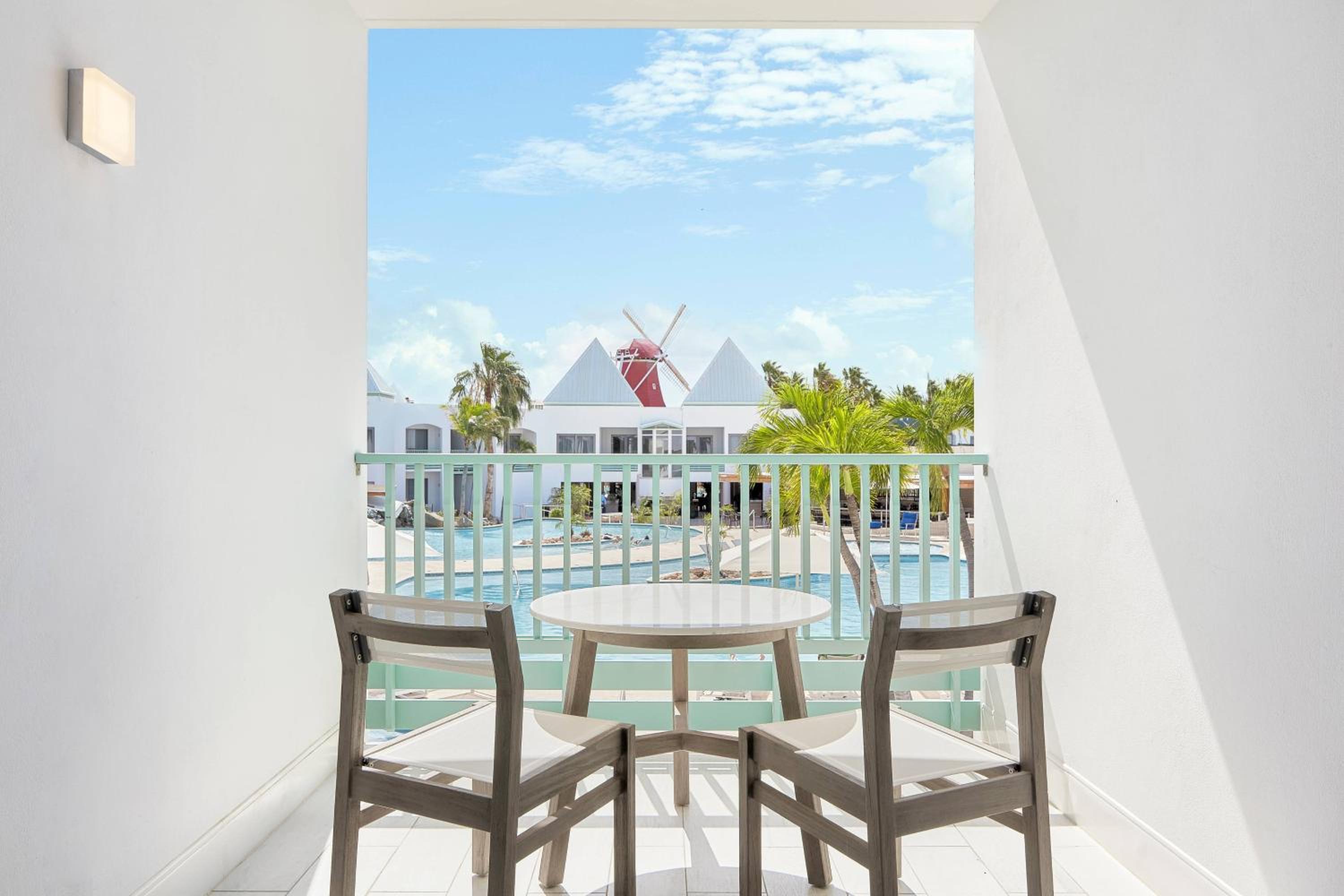 Queen Room with Two Queen Beds and Pool View - Photo 2