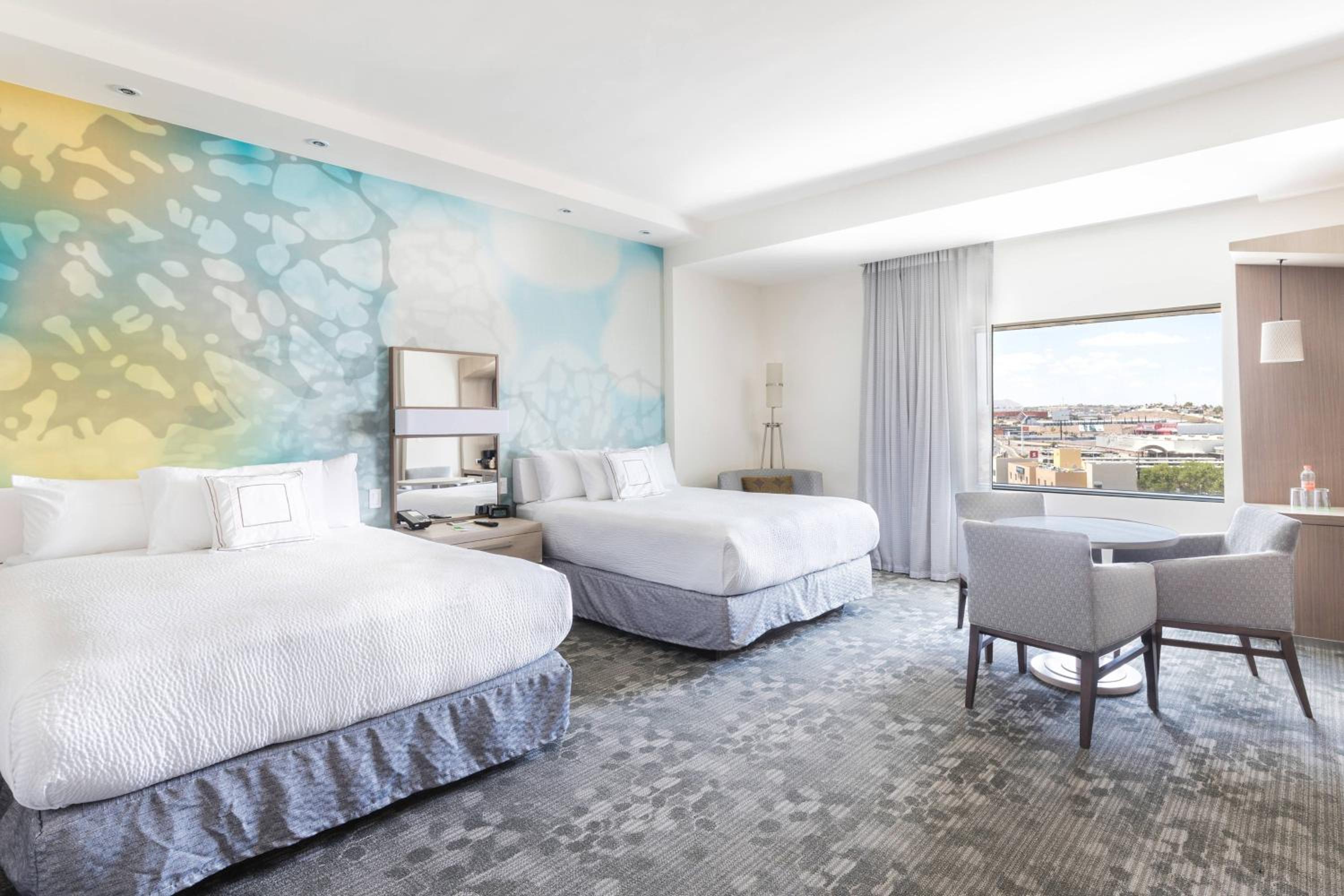 Larger Queen Room with Two Queen Beds photo 2