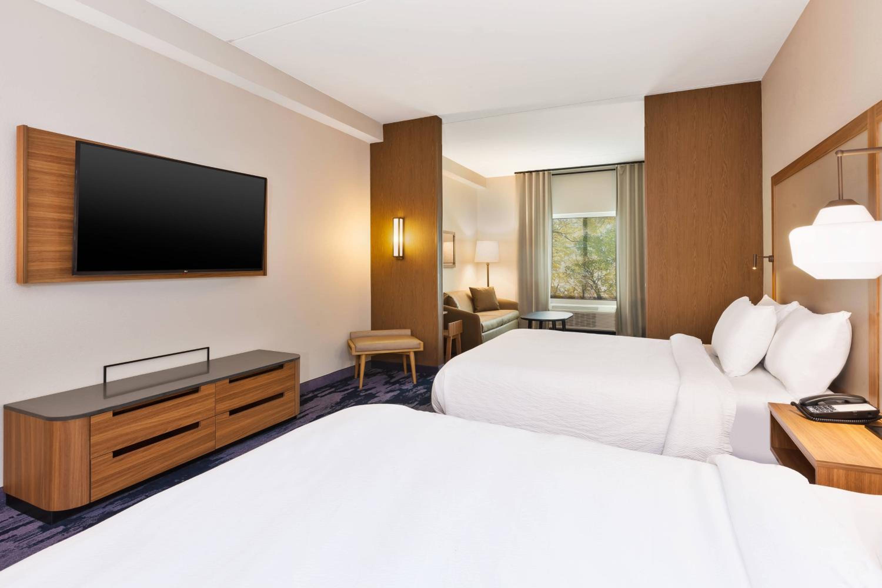 Queen Suite with Two Queen Beds and Sofa Bed