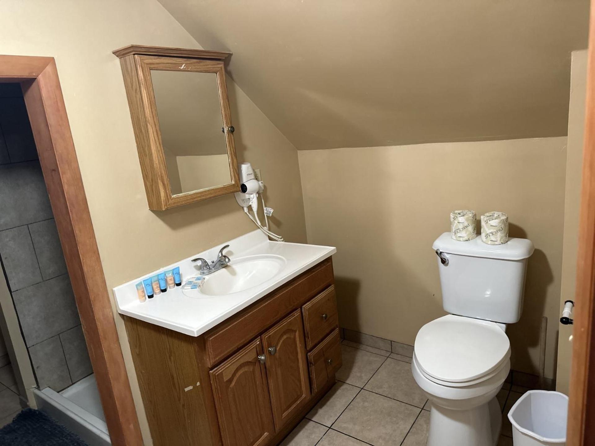 Three-Bedroom House - Photo 16