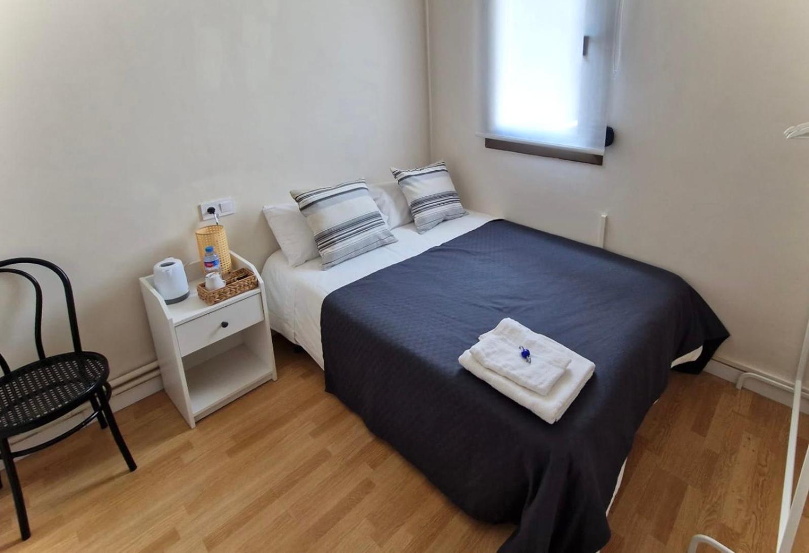 Habitación individual con baño compartido