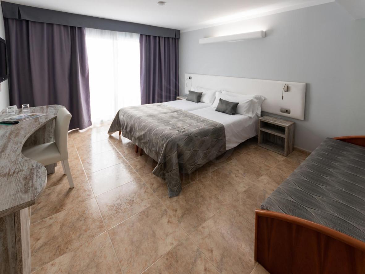 Quadruple Room with Balcony