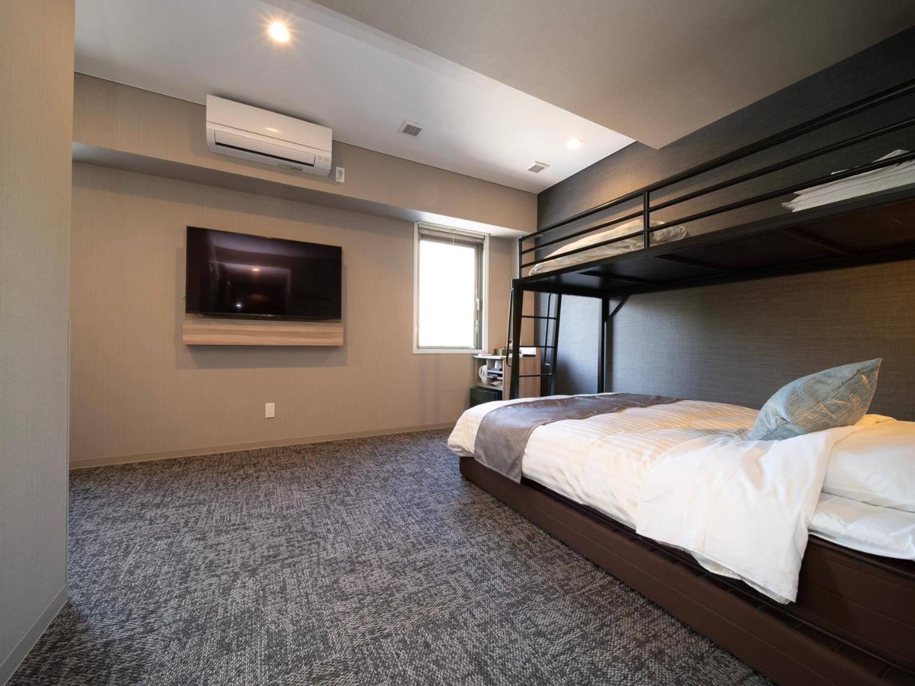 Standard Quadruple Room With Bunk Bed - Non-Smoking photo 2