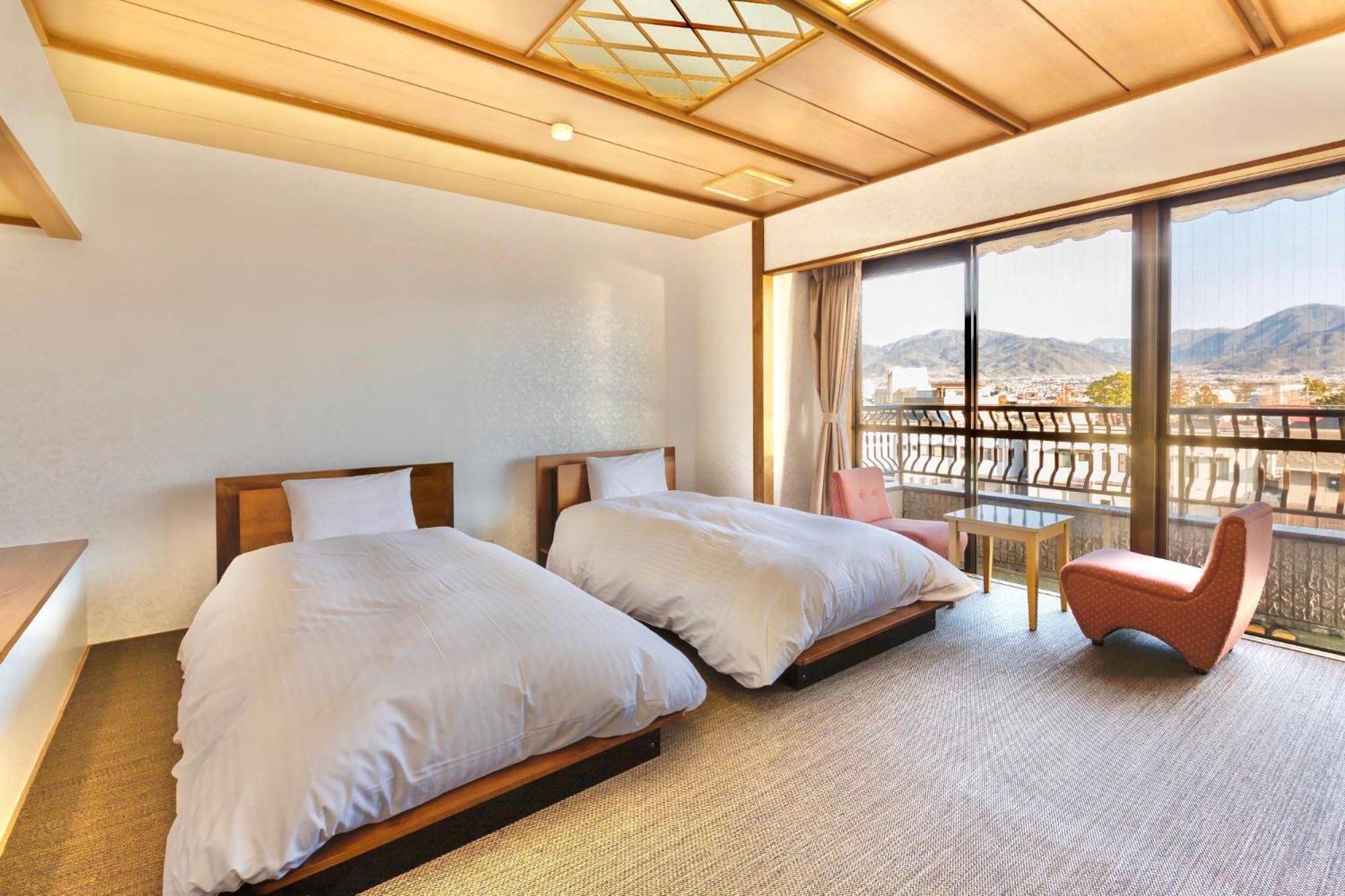Standard Twin Room - Photo 1