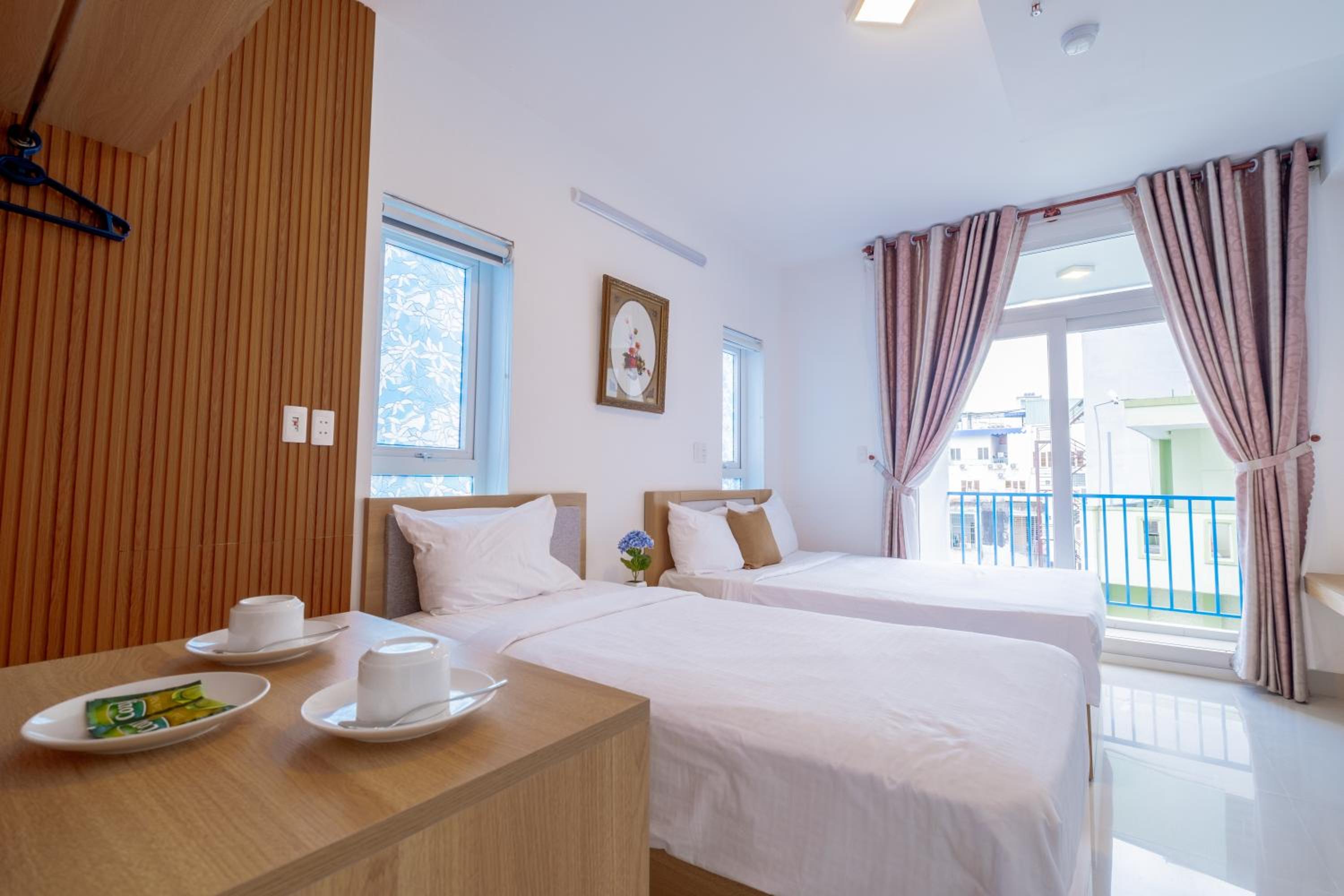 Deluxe Quadruple Room - Photo 16