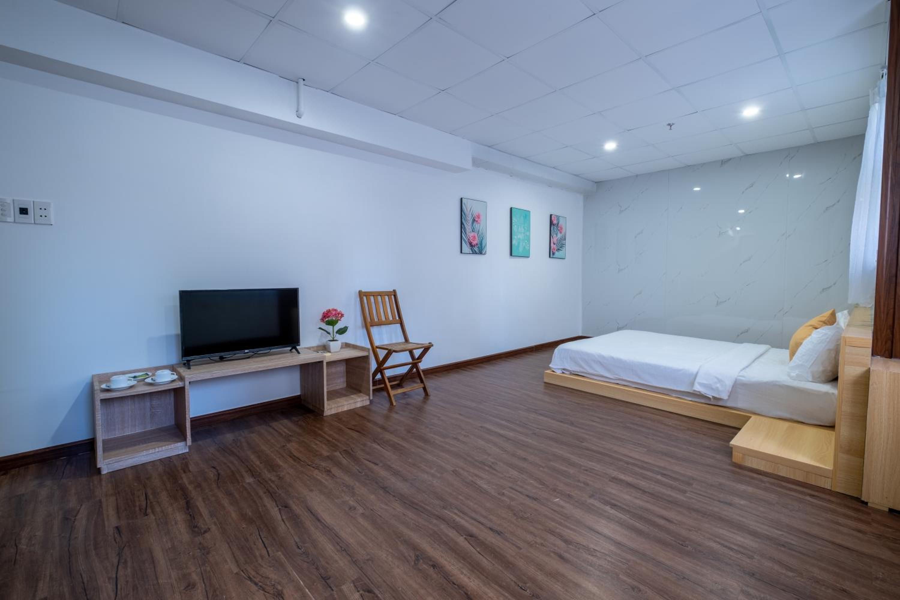 Deluxe Quadruple Room - Photo 7