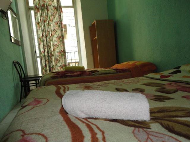 Habitación Doble o con Dos Camas con Baño Compartido