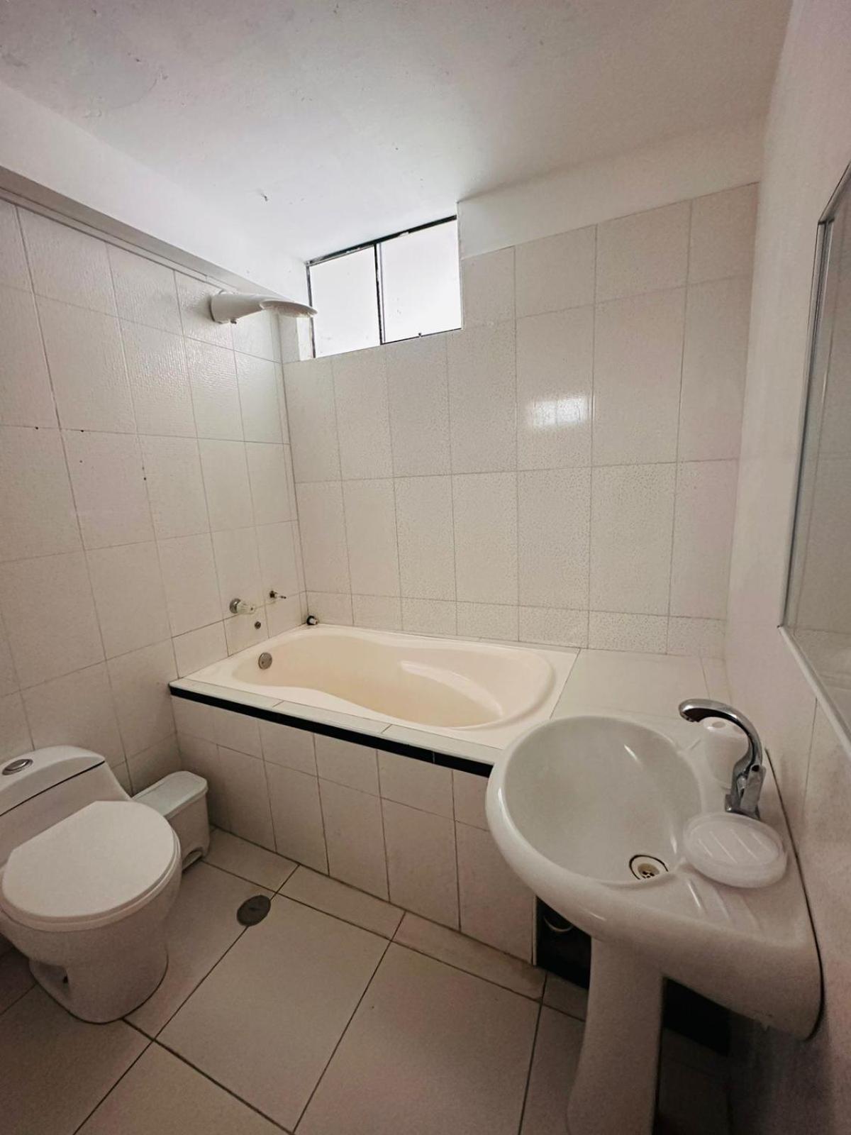 Three-Bedroom Apartment photo 2
