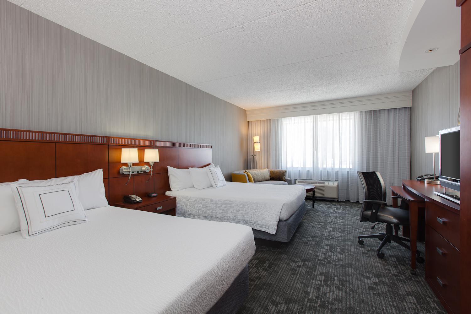 Queen Room with Two Queen Beds - Photo 1