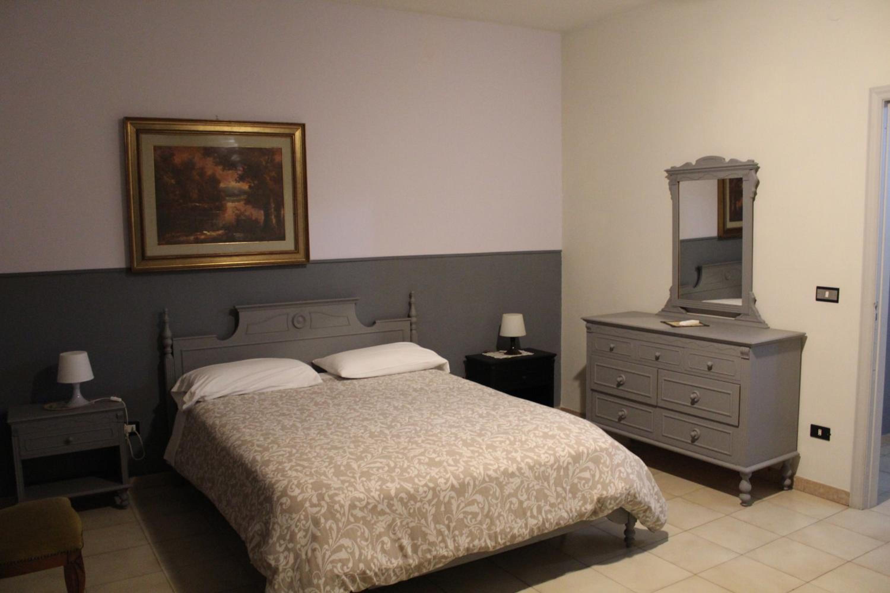 Three-Bedroom House - Photo 32