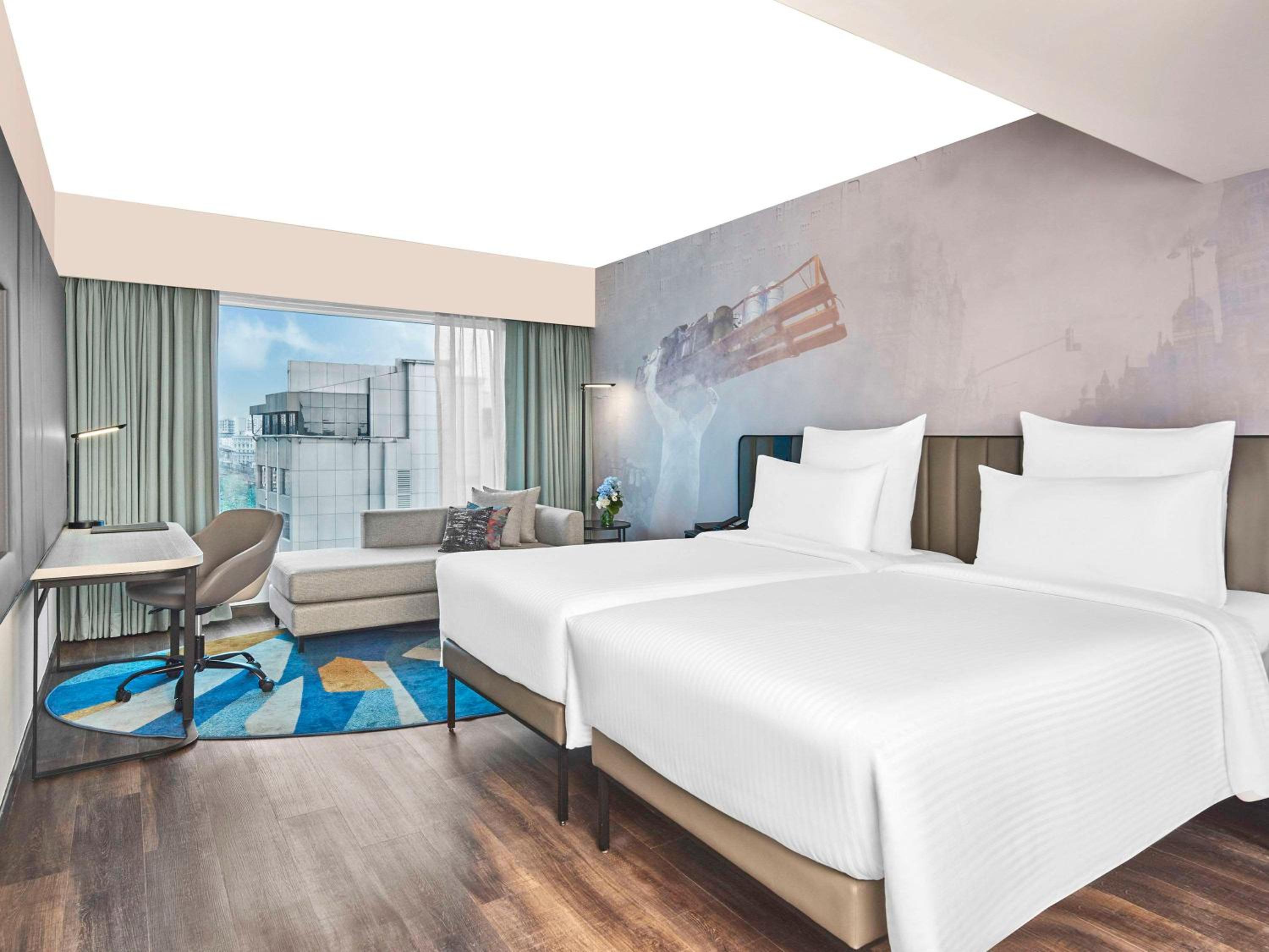 Standard Twin Room with 1+1 Happy Hours from 5pm to 7 pm on select beverages , 20% Discount on Spa on select packages, Laundry, and Food & Soft Beverages