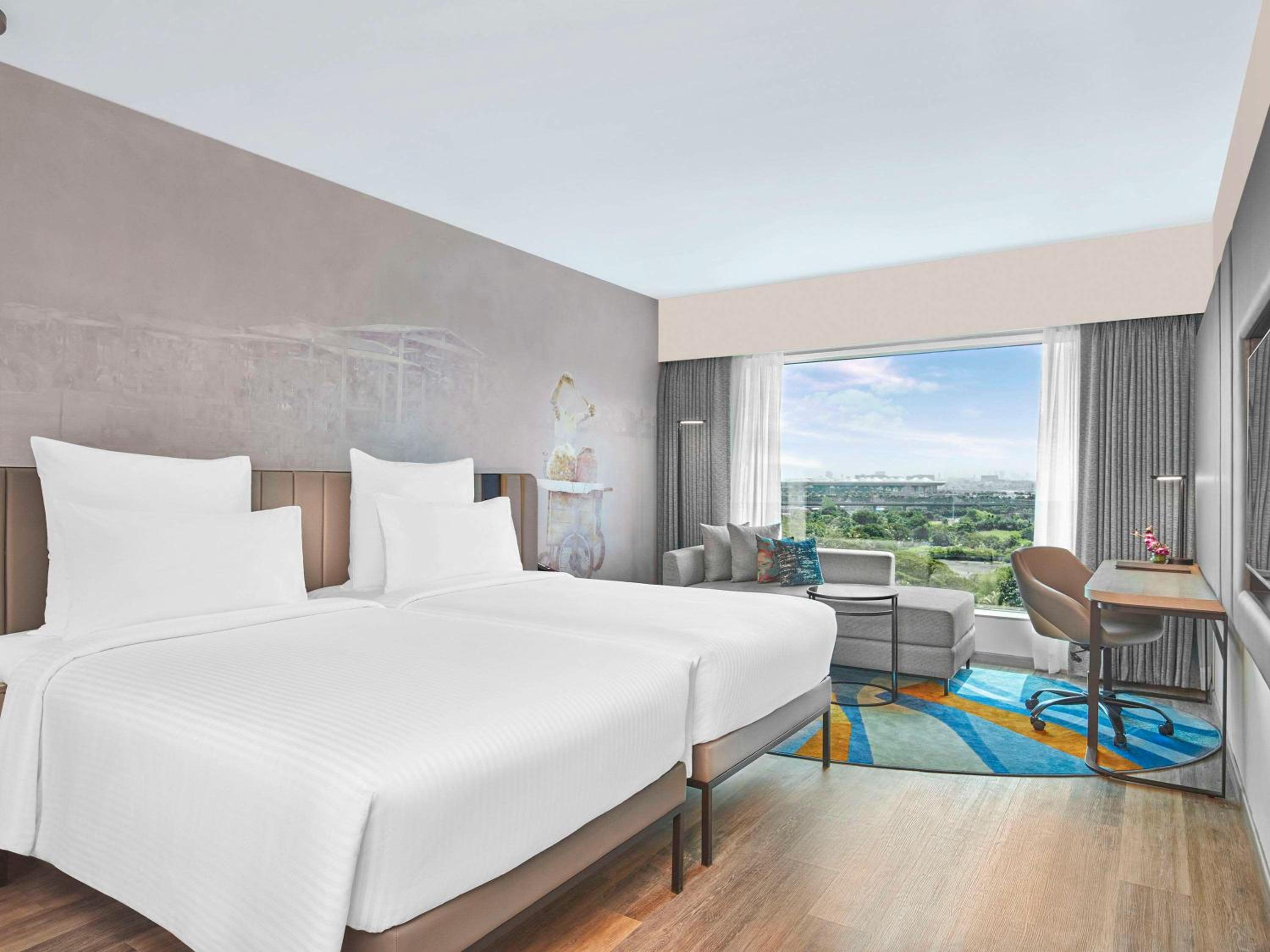 Executive Twin Bed with Cocktail Hours , Short Eats and 20% Discount on Spa, Laundry, and Food & Soft Beverages