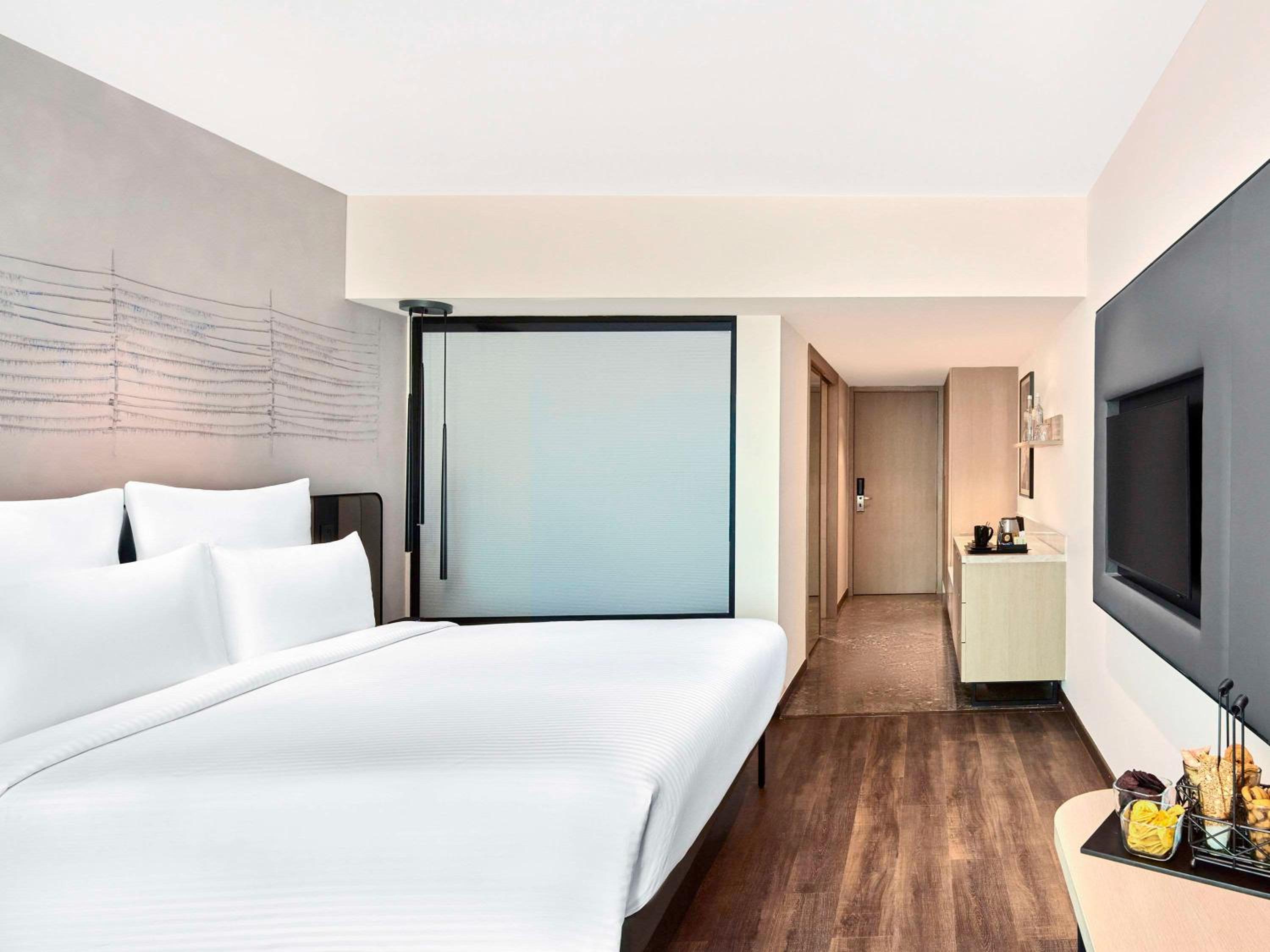 Standard Double Room with 1+1 Happy Hours from 5pm to 7 pm on select beverages , 20% Discount on Spa on select packages, Laundry, and Food & Soft Beverages