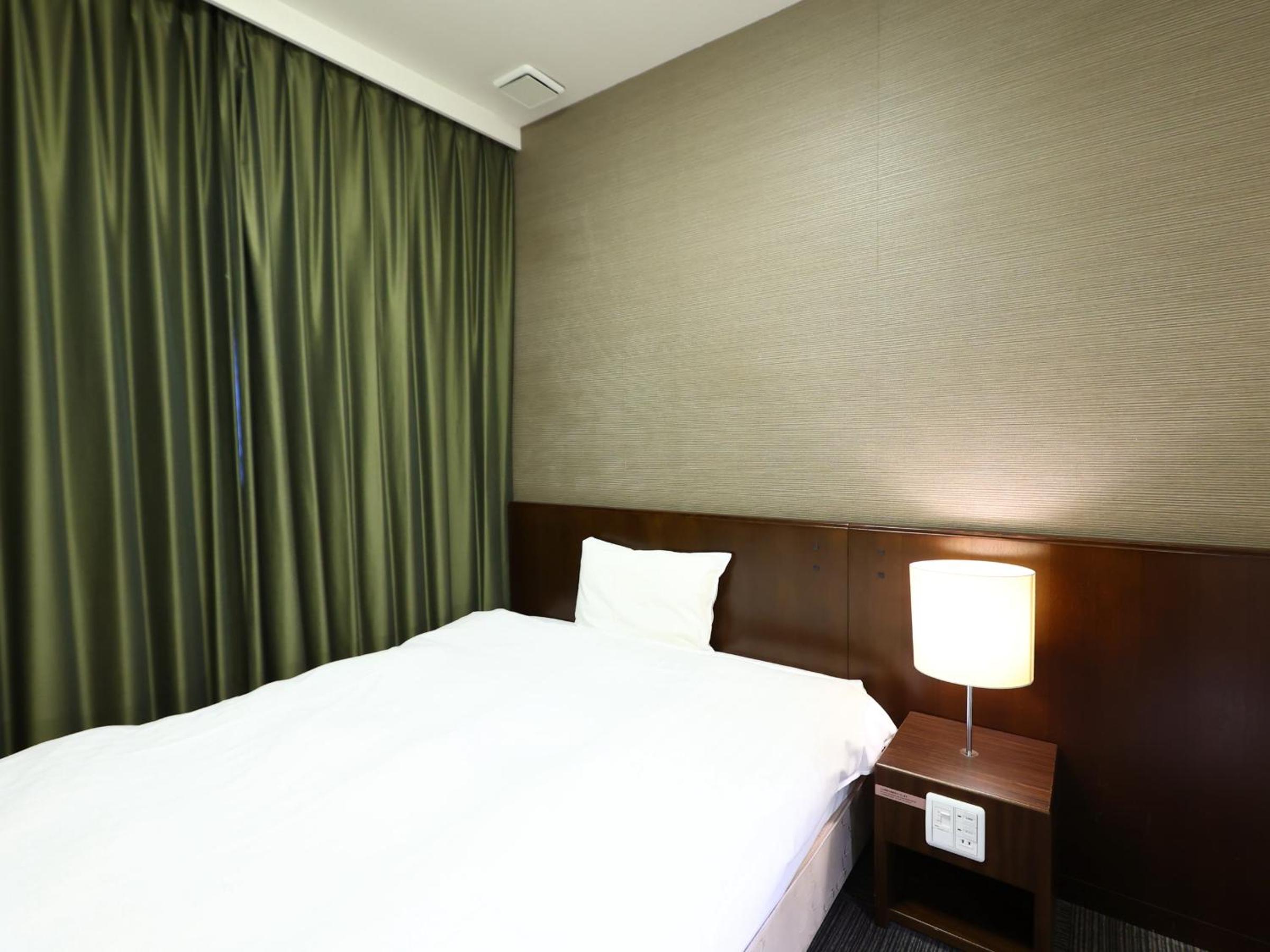 Economy Single Room with Toilet - Non-Smoking (No shower, No view) photo 1