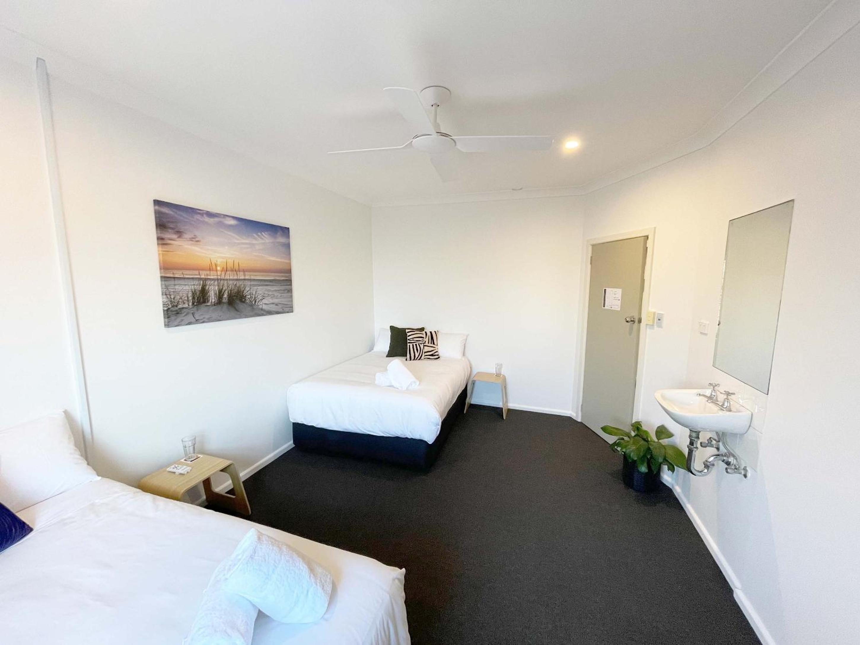 Twin Room with Two Double Beds and Shared Bathroom