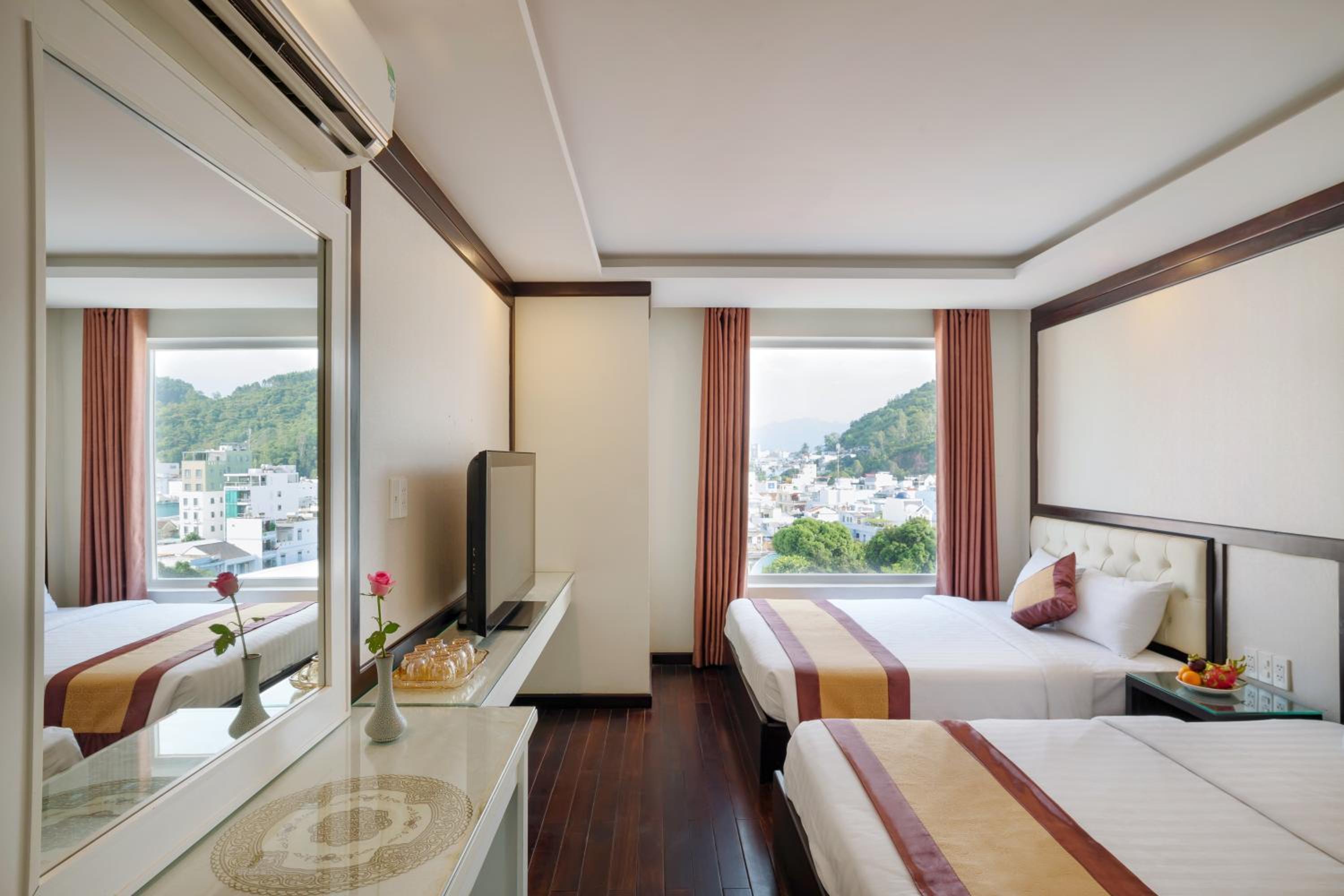 Deluxe Triple Room - Photo 7