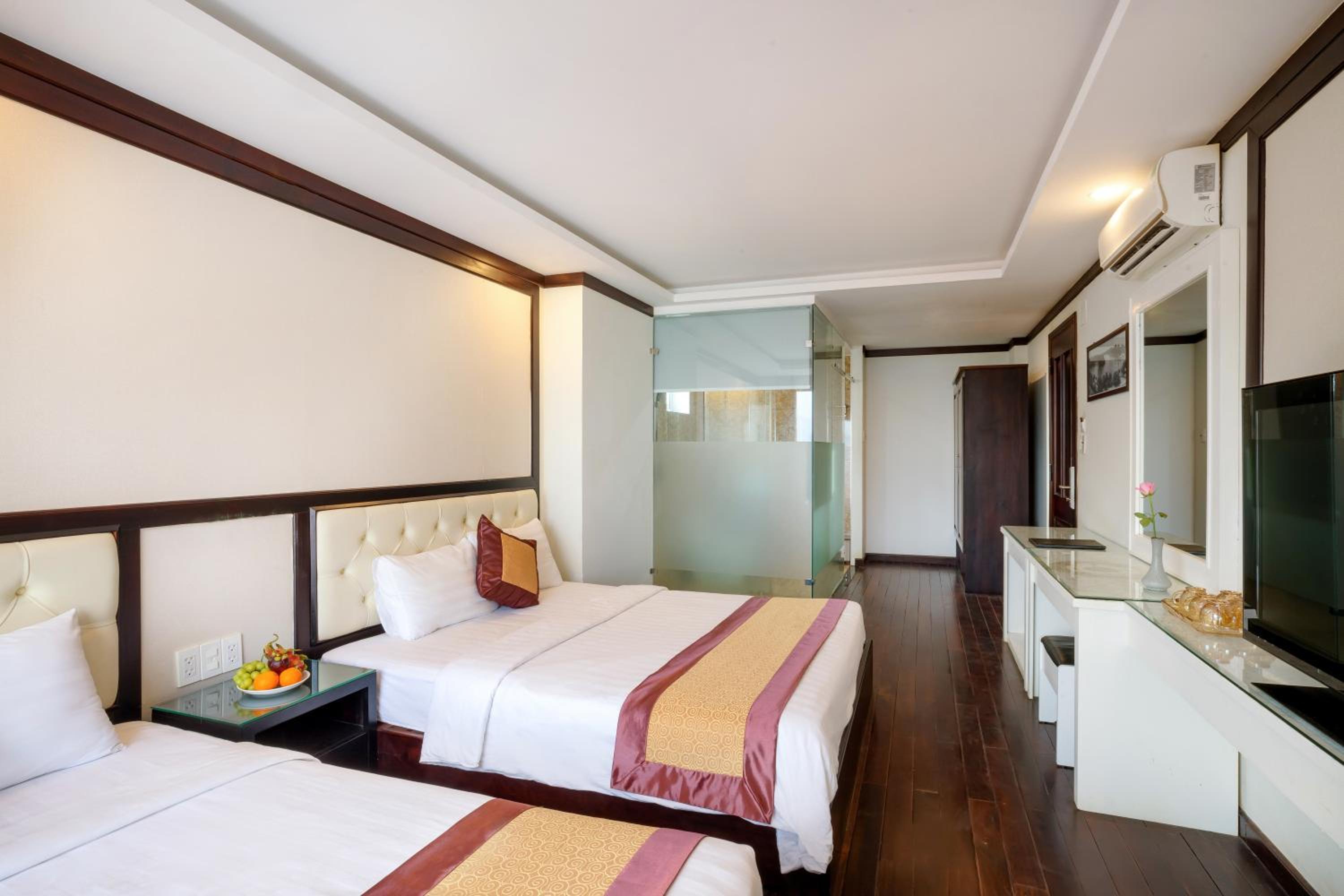 Deluxe Triple Room - Photo 2