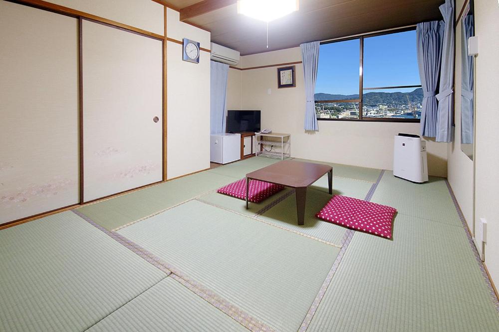 Japanese-Style Triple Room - Smoking photo 1