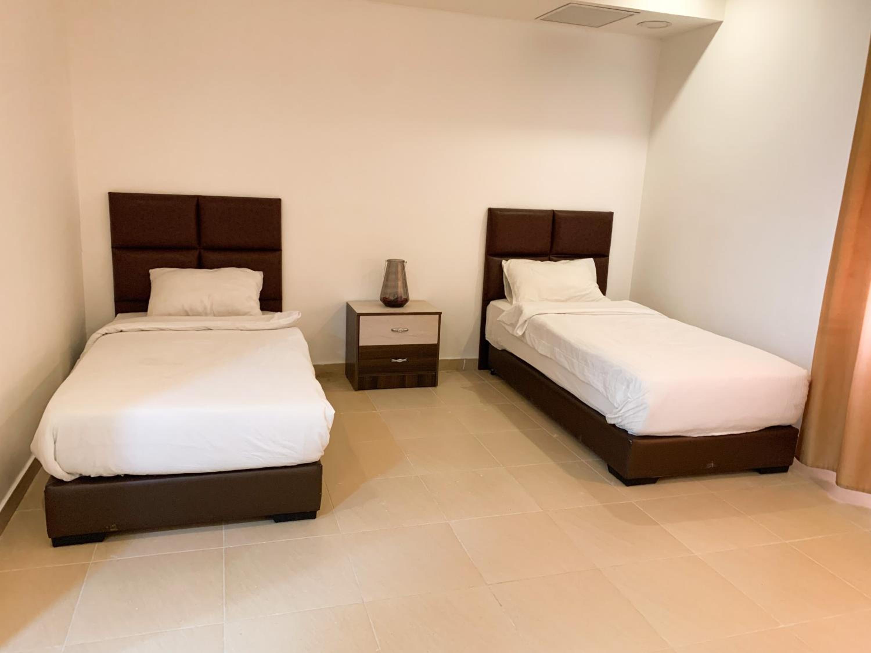 Three-Bedroom Apartment - Photo 9