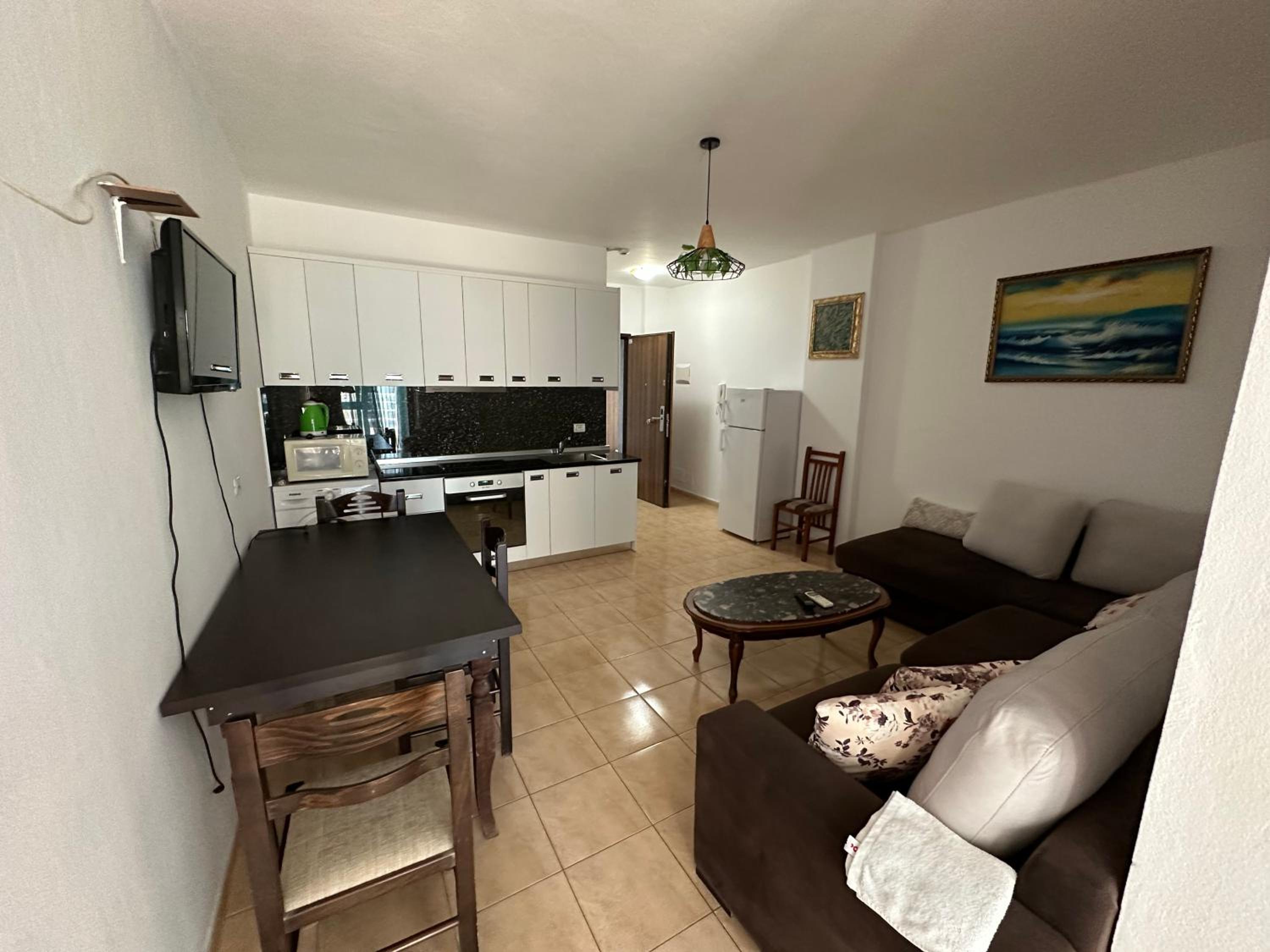 One-Bedroom Apartment with Balcony and Sea View