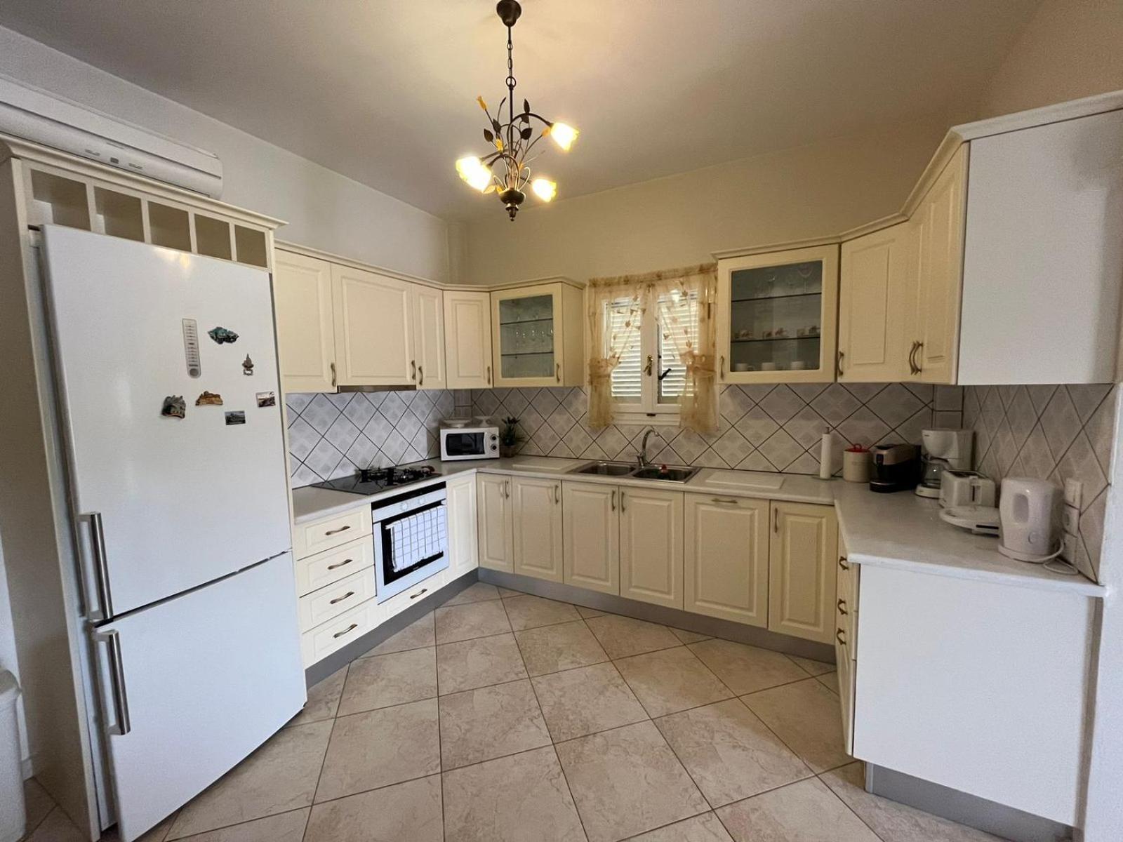 Three-Bedroom House - Photo 14