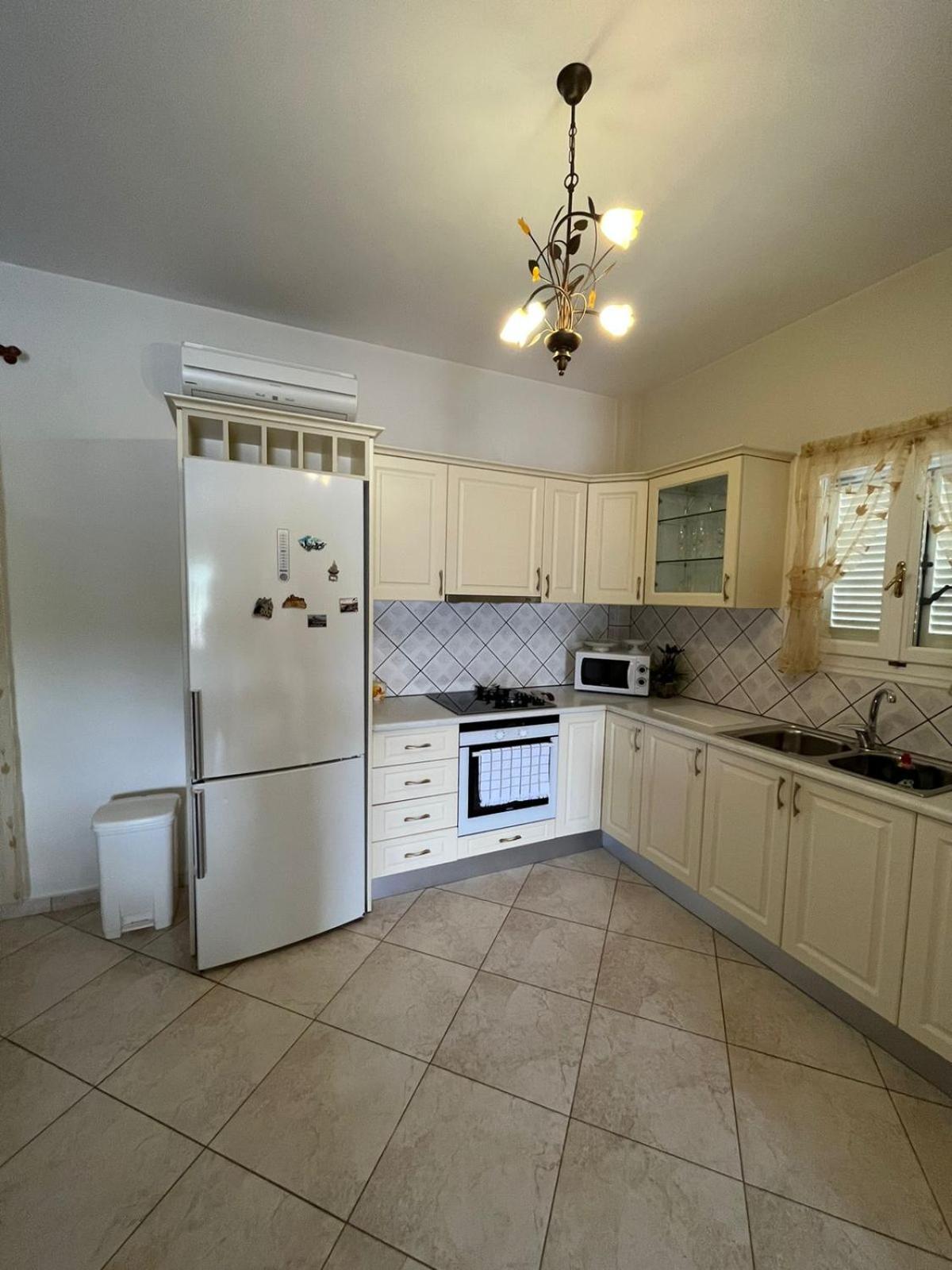 Three-Bedroom House - Photo 17