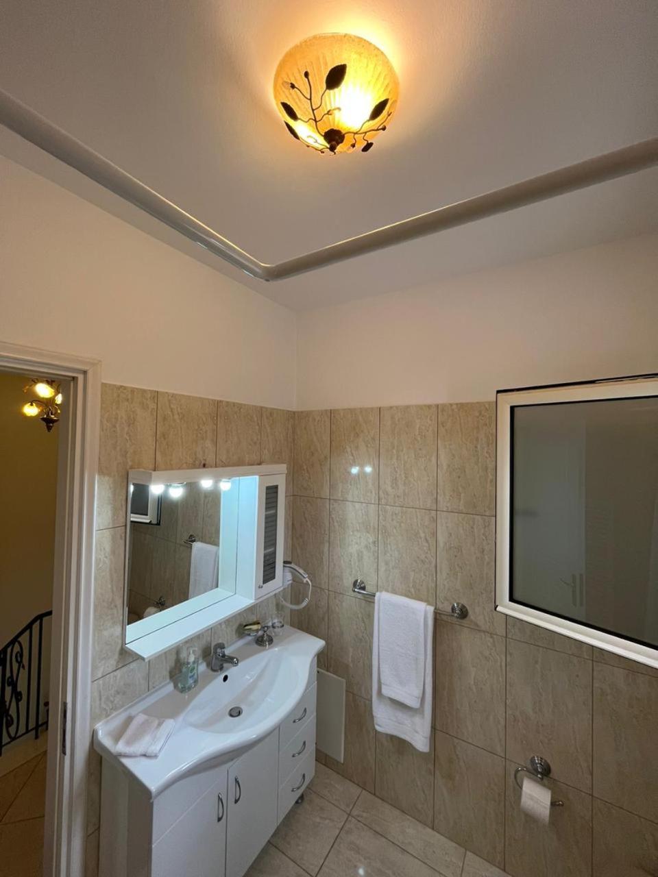 Three-Bedroom House - Photo 22