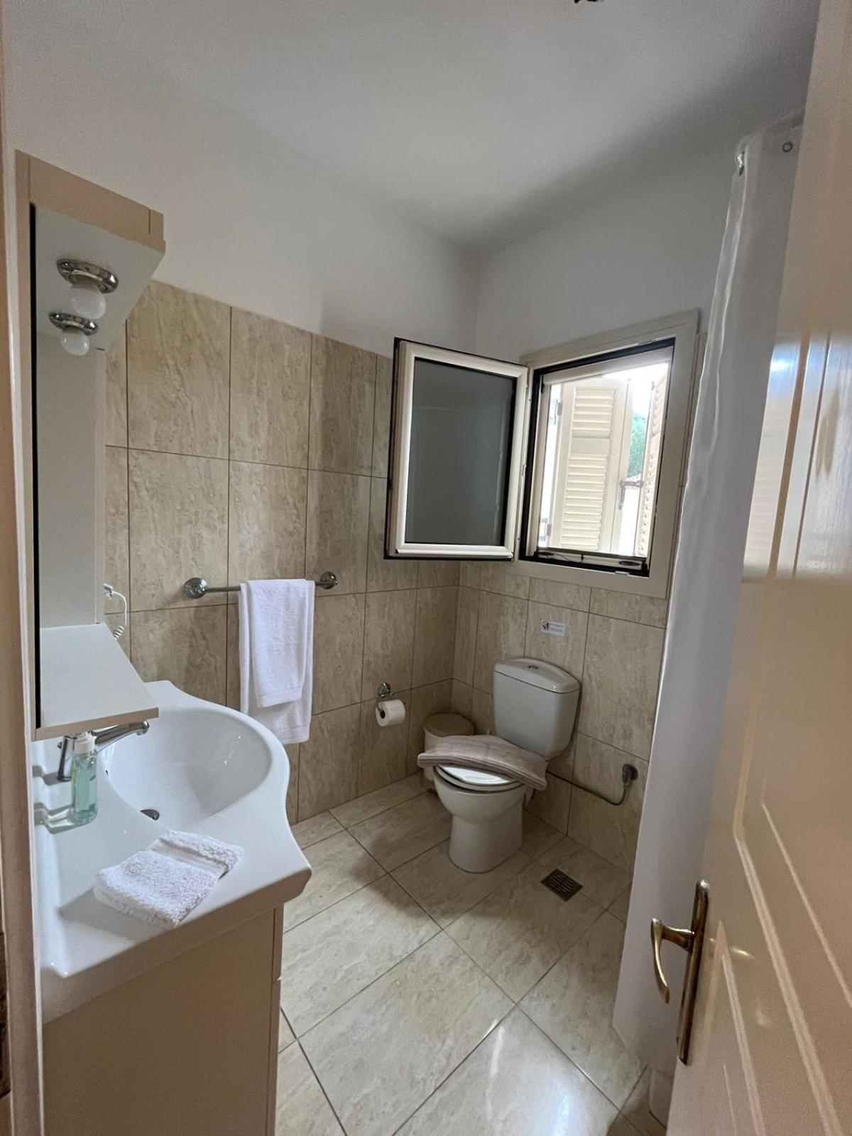 Three-Bedroom House - Photo 24