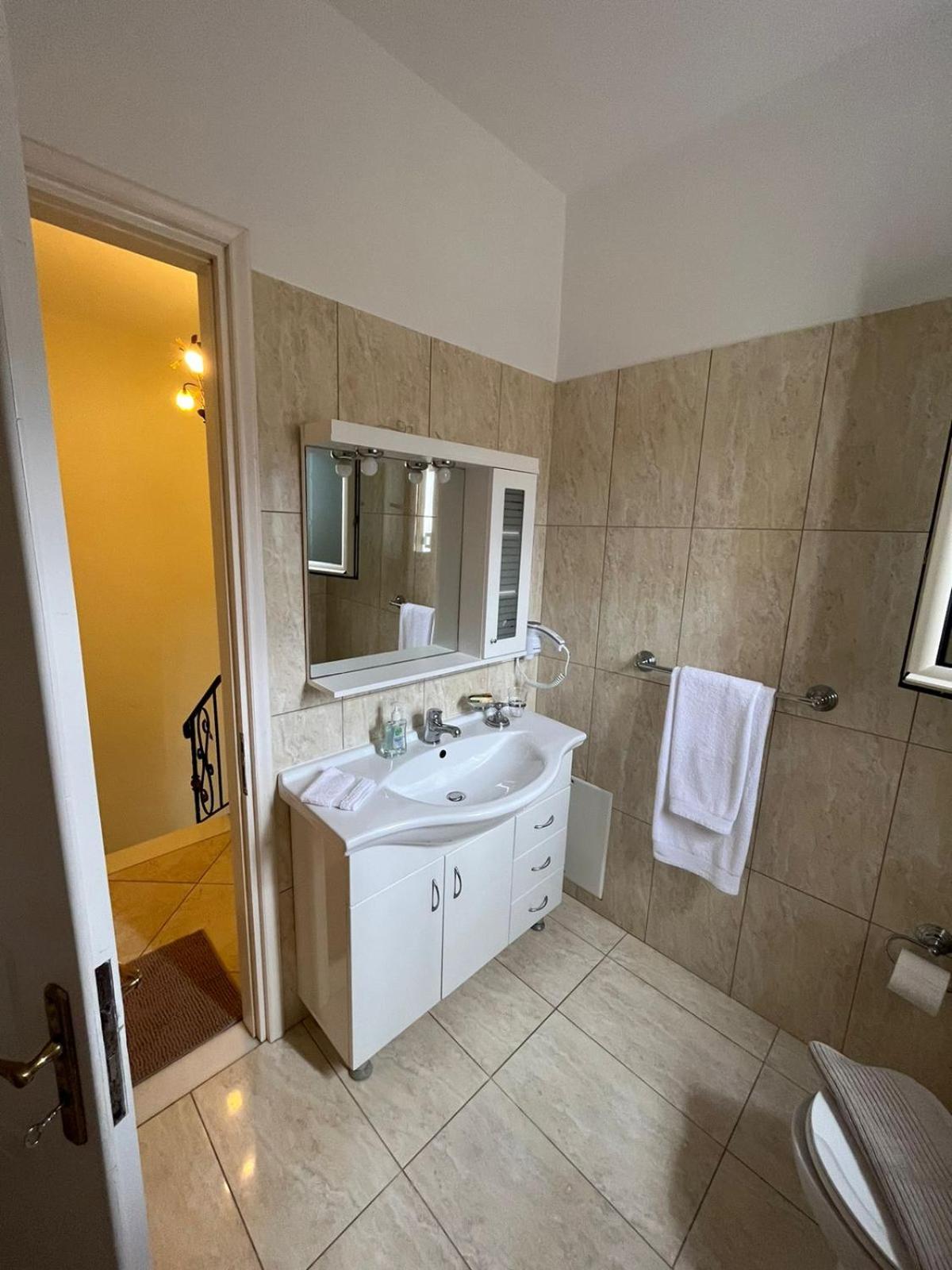 Three-Bedroom House - Photo 65