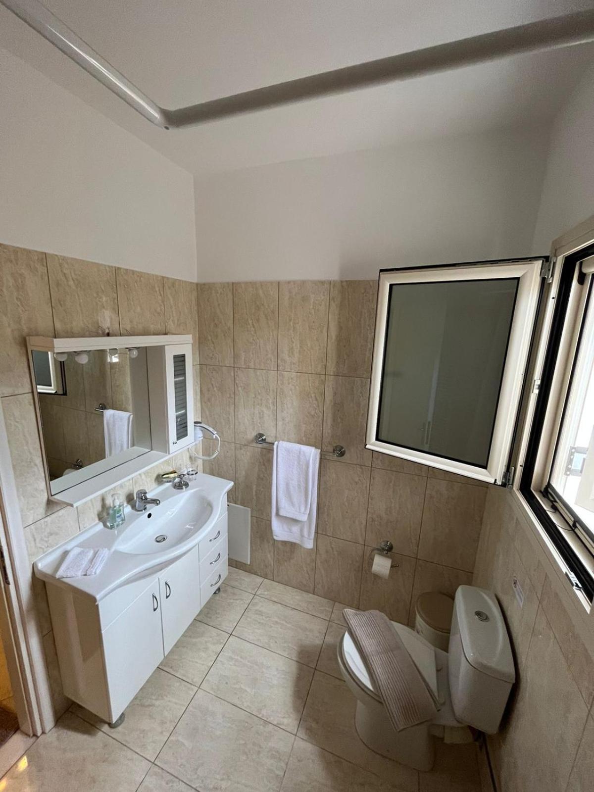 Three-Bedroom House - Photo 66