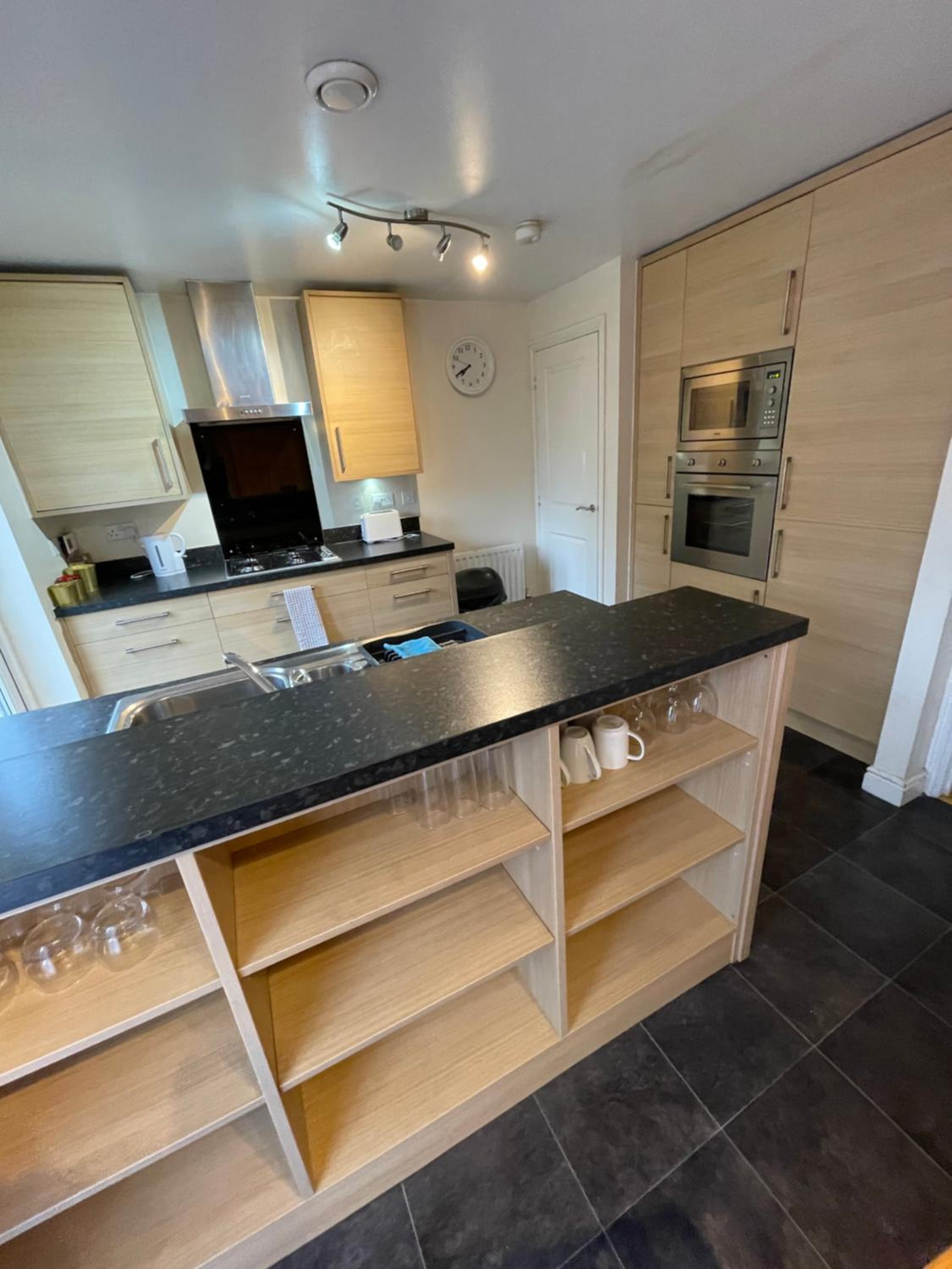 Three-Bedroom House - Photo 22