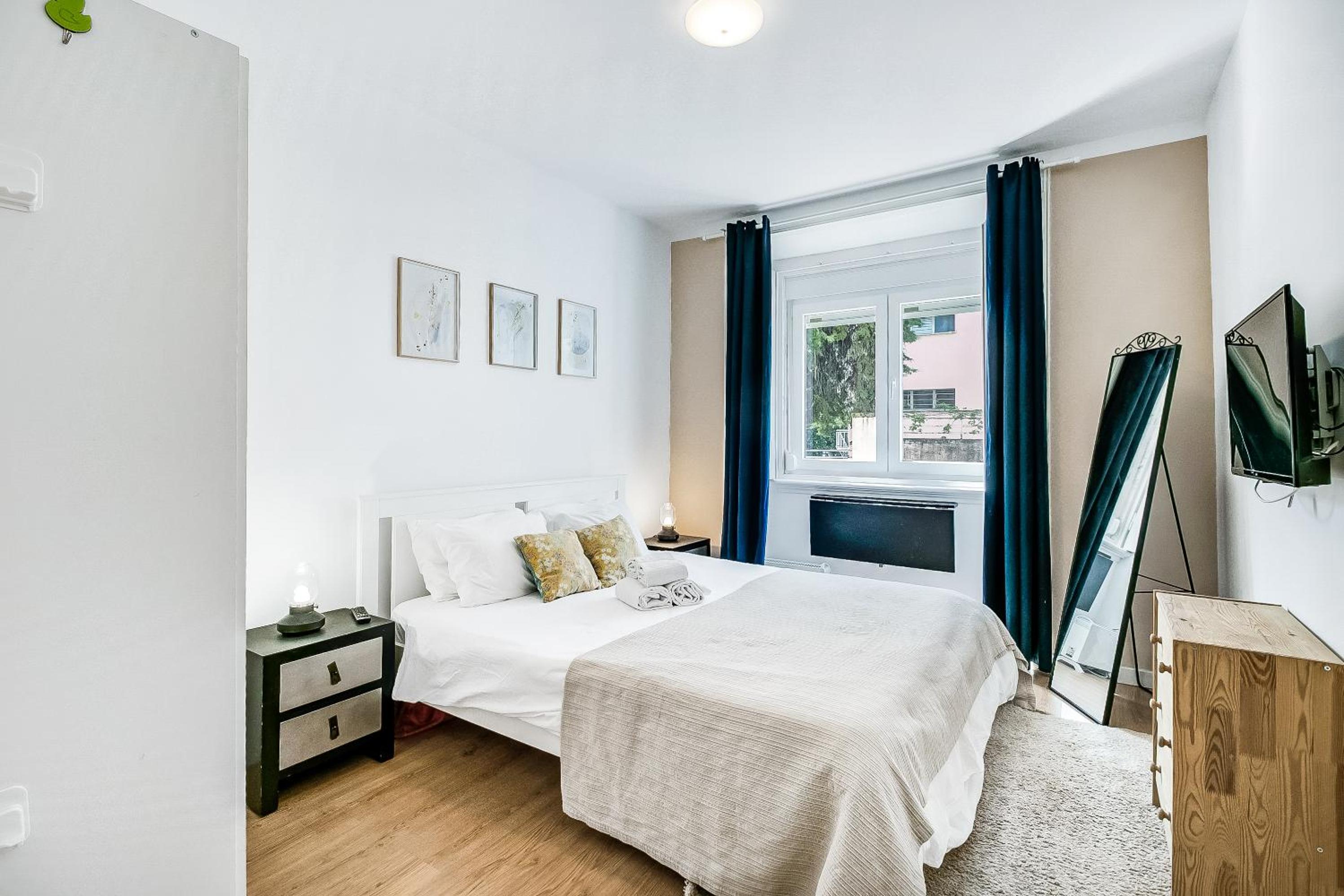 Three-Bedroom Apartment - Photo 11