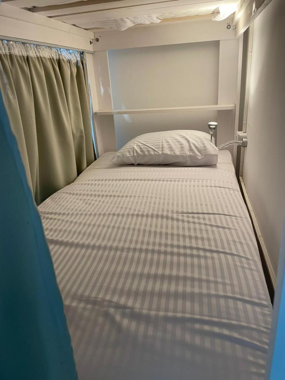 Single Bed in Male Dormitory Room photo 1