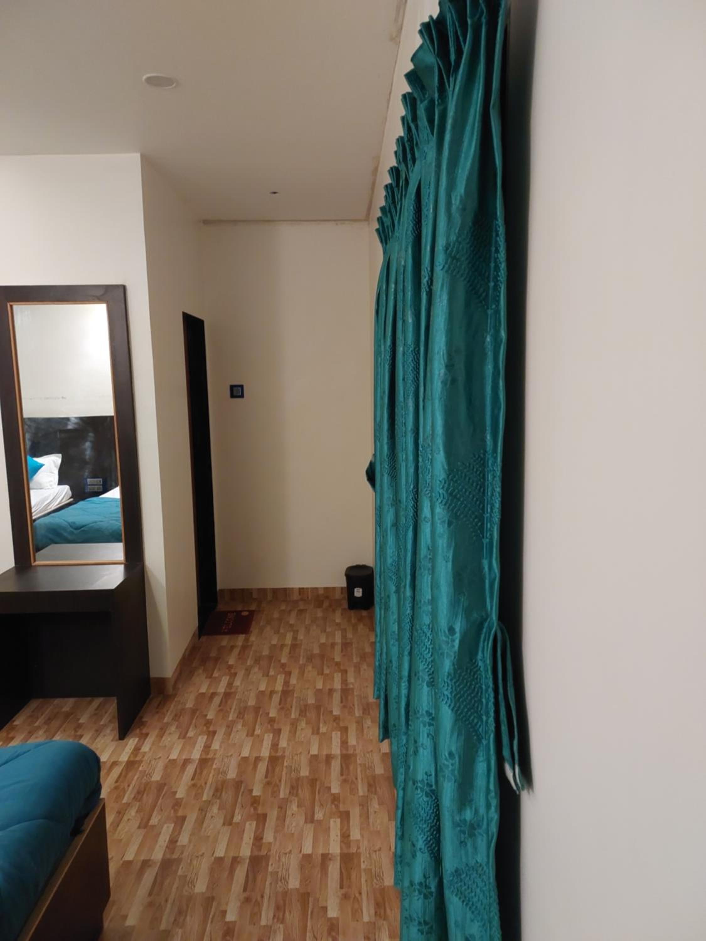 Economy Quadruple Room - Photo 35