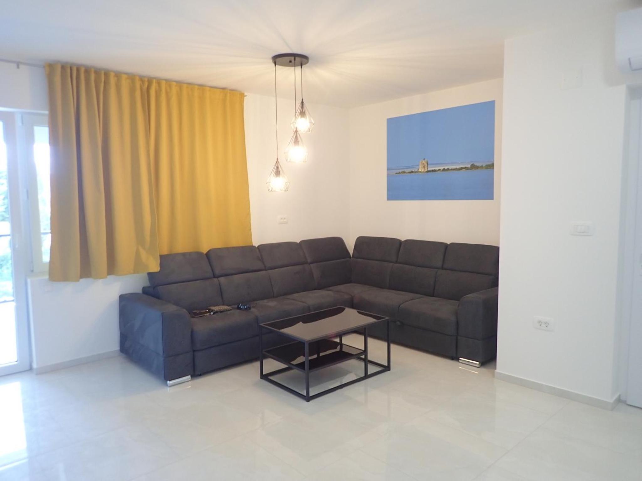 Three-Bedroom Apartment photo 1