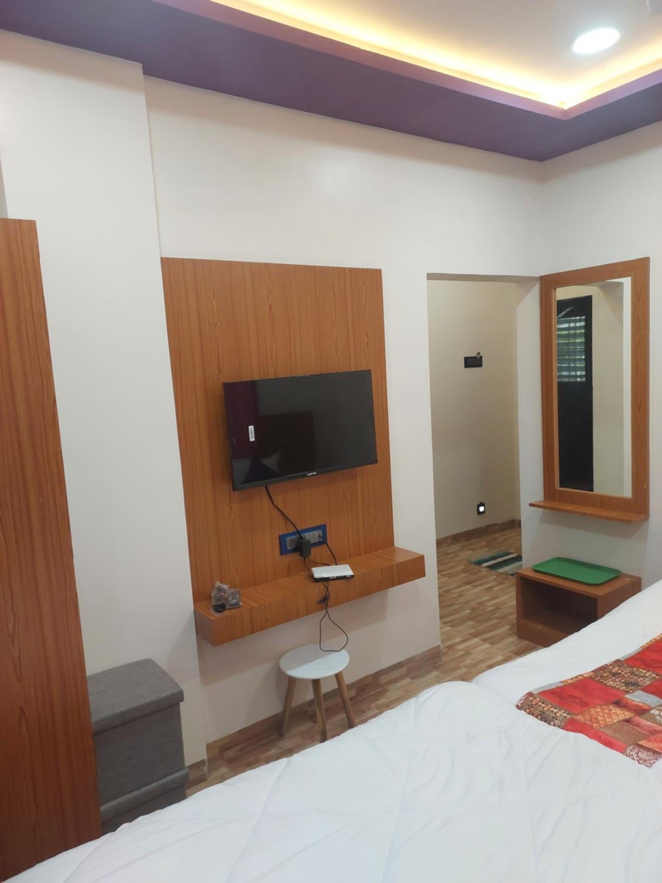 Deluxe Family Suite - Photo 15